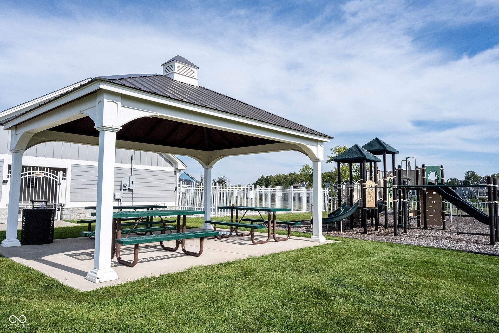 Covered picnic area and playground in the neighborhood