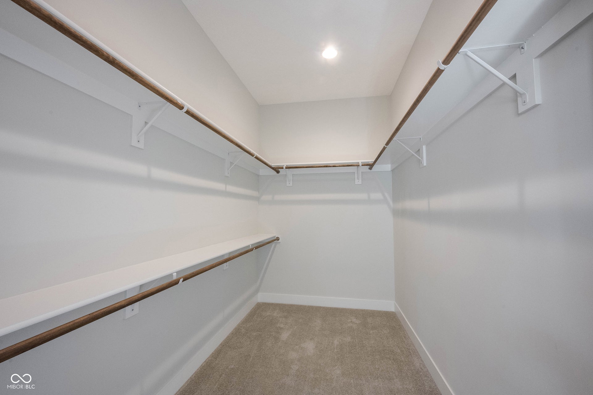 Primary Closet - Pole and Board - no wire shelving in this house!
