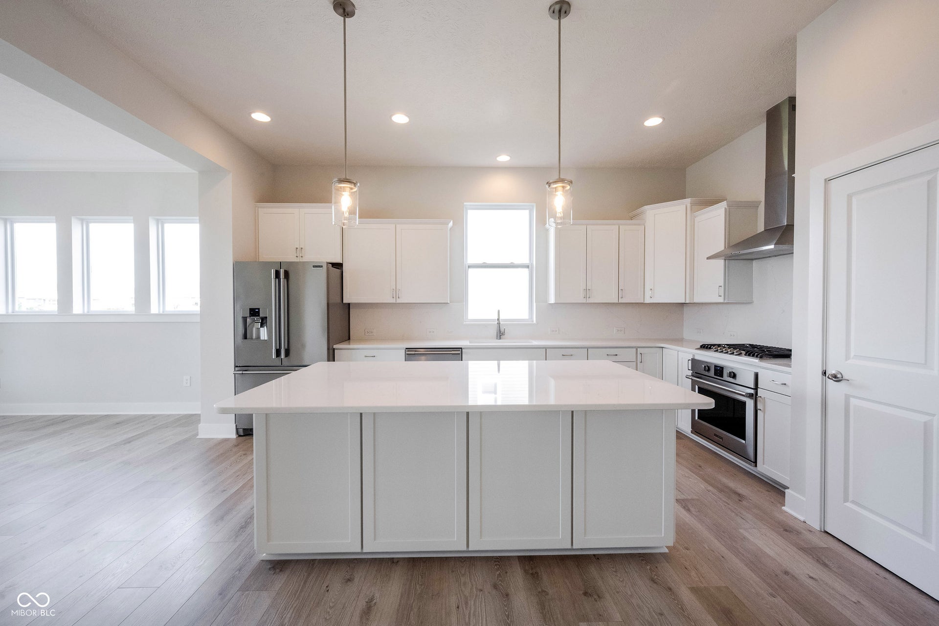 The kitchen island has additional cabinet storage