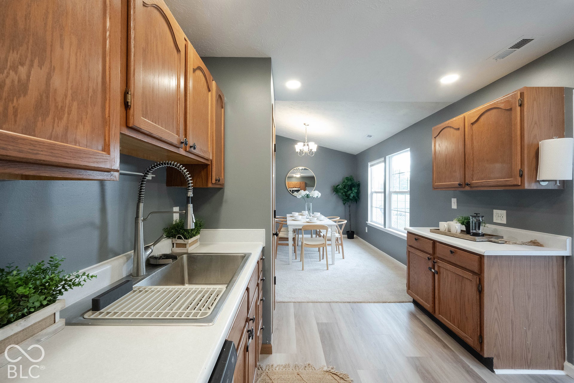 Another view of the kitchen connecting to the dining area.