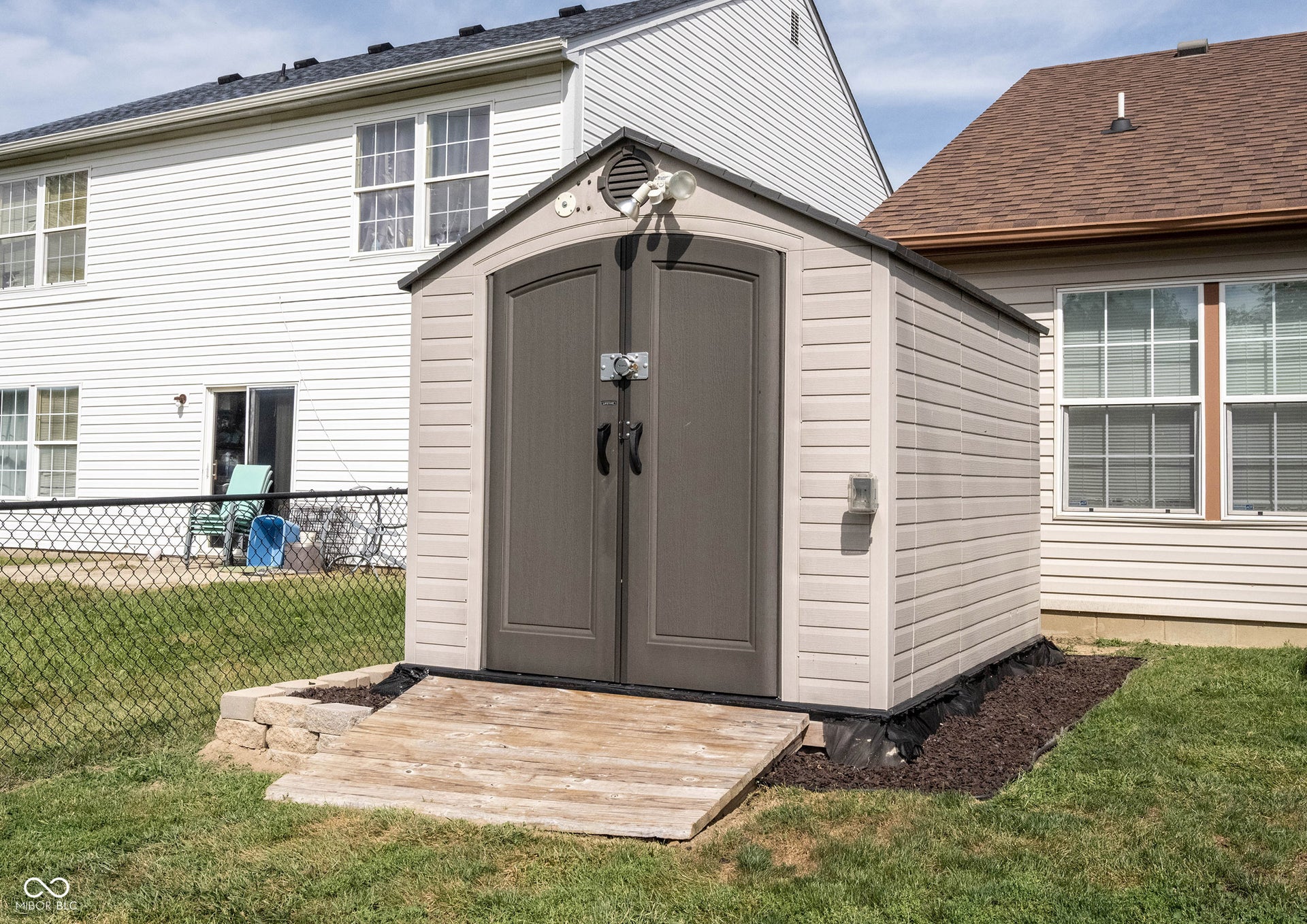This home also features a convenient storage shed!
