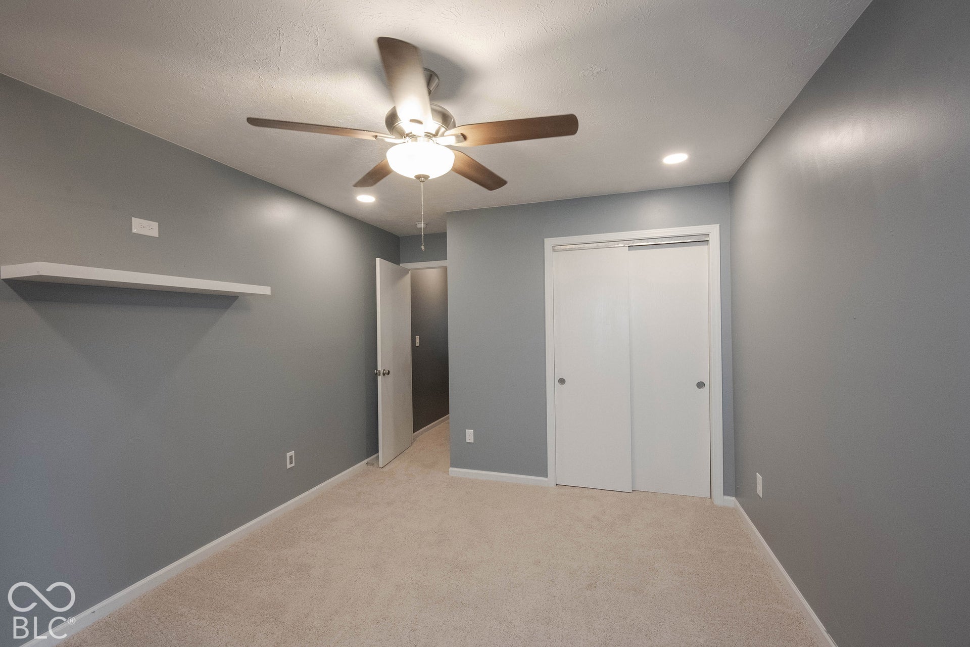 Built-in shelving adds to the storage space!