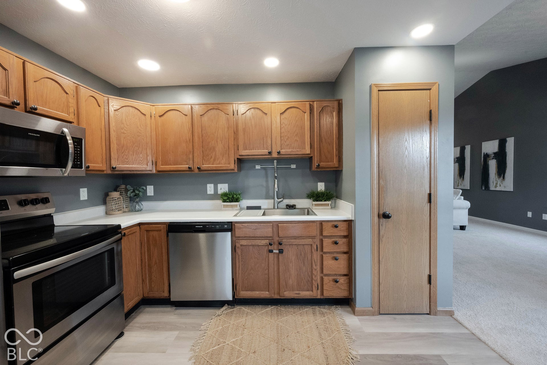 This kitchen also features a dedicated pantry closet!