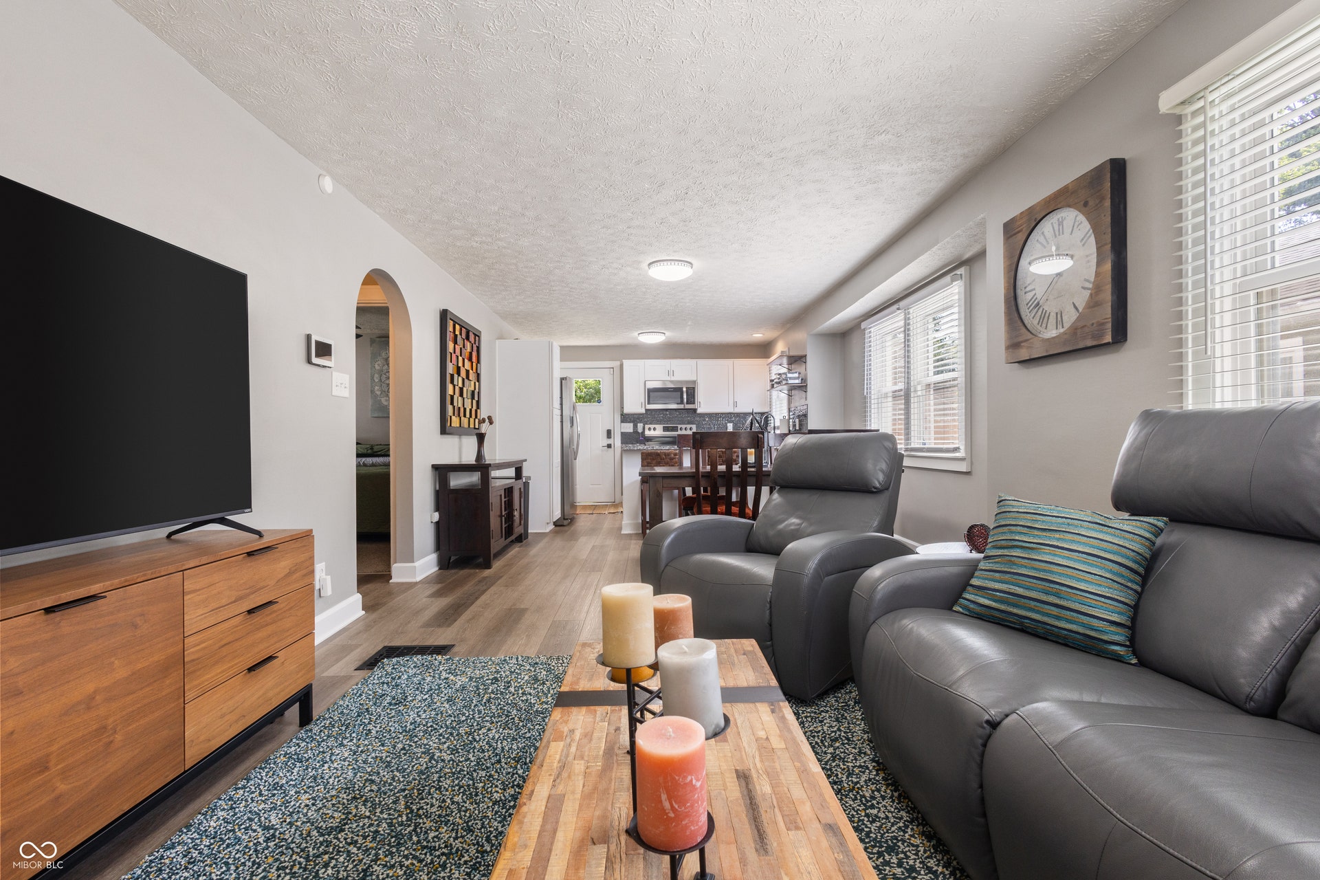 4927 Caroline Avenue, Indianapolis, IN 46205 Wood-finish flooring throughout, with an arched doorway