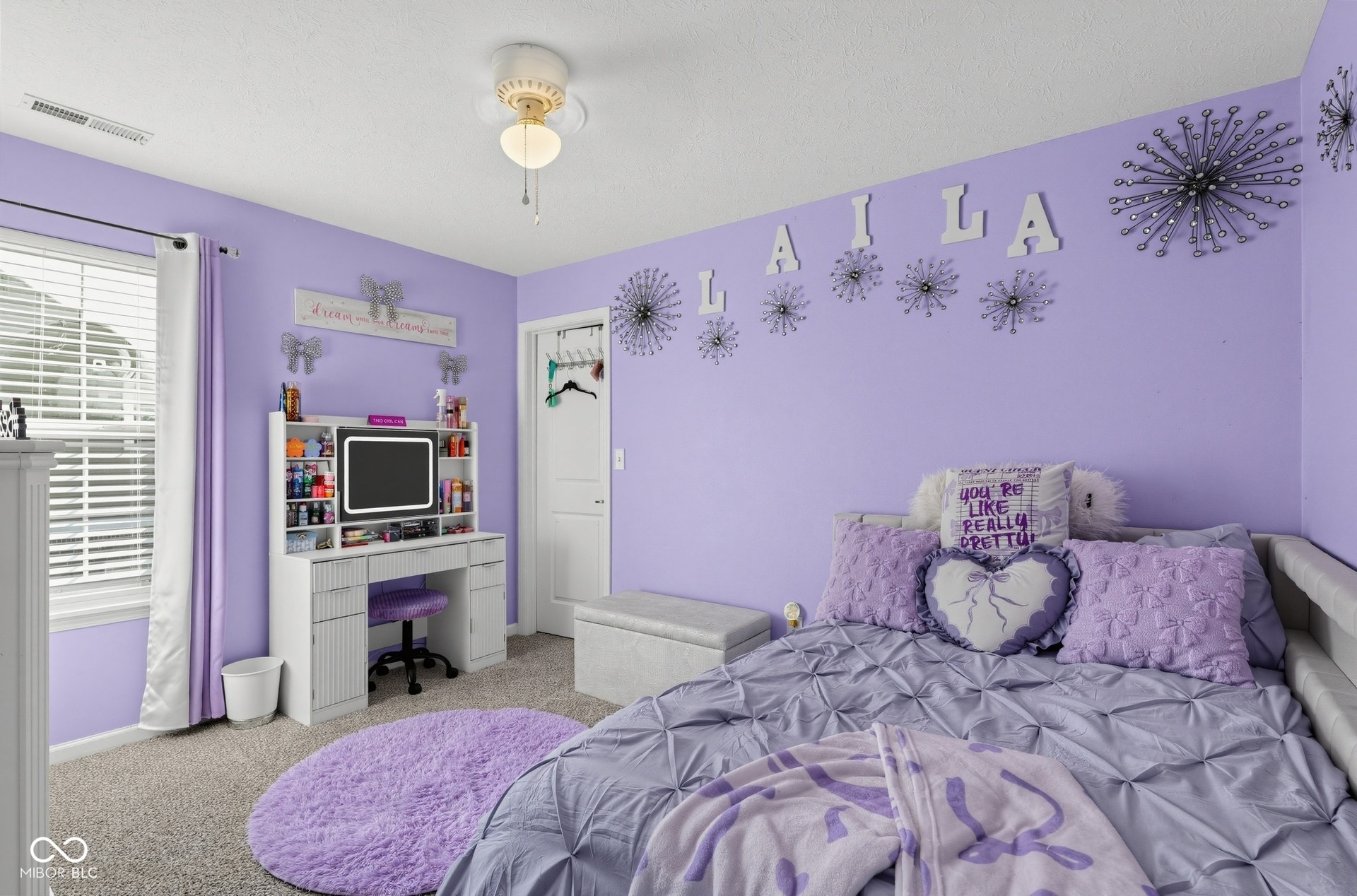 3394 S Bennett Drive, New Palestine, IN 46163 Bedroom 2 continued. Window with blinds, wall-to-wall carpeting, ceiling fan with integrated lighting, and a built-in desk with shelving