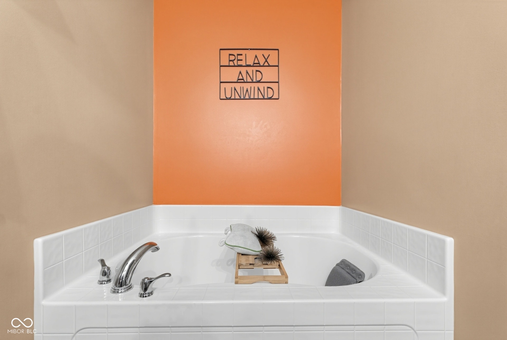 3394 S Bennett Drive, New Palestine, IN 46163 Corner soaking tub with chrome fixtures and white tile surround