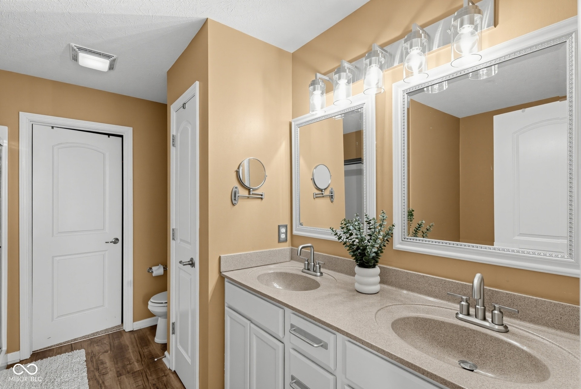 3394 S Bennett Drive, New Palestine, IN 46163 Double vanity with integrated sinks, framed mirrors, and chrome fixtures