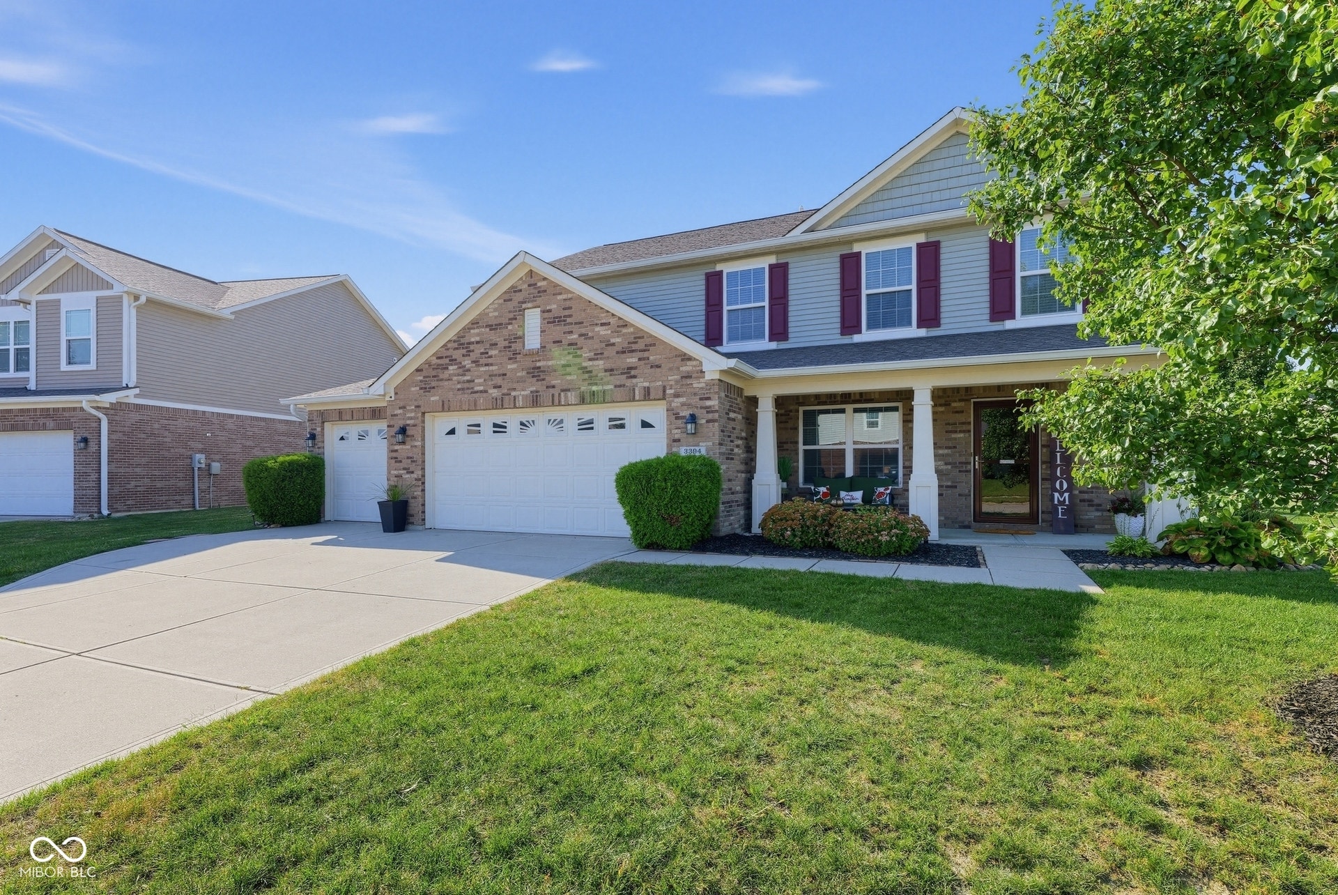 3394 S Bennett Drive, New Palestine, IN 46163 Two-story exterior with brick and siding facade
