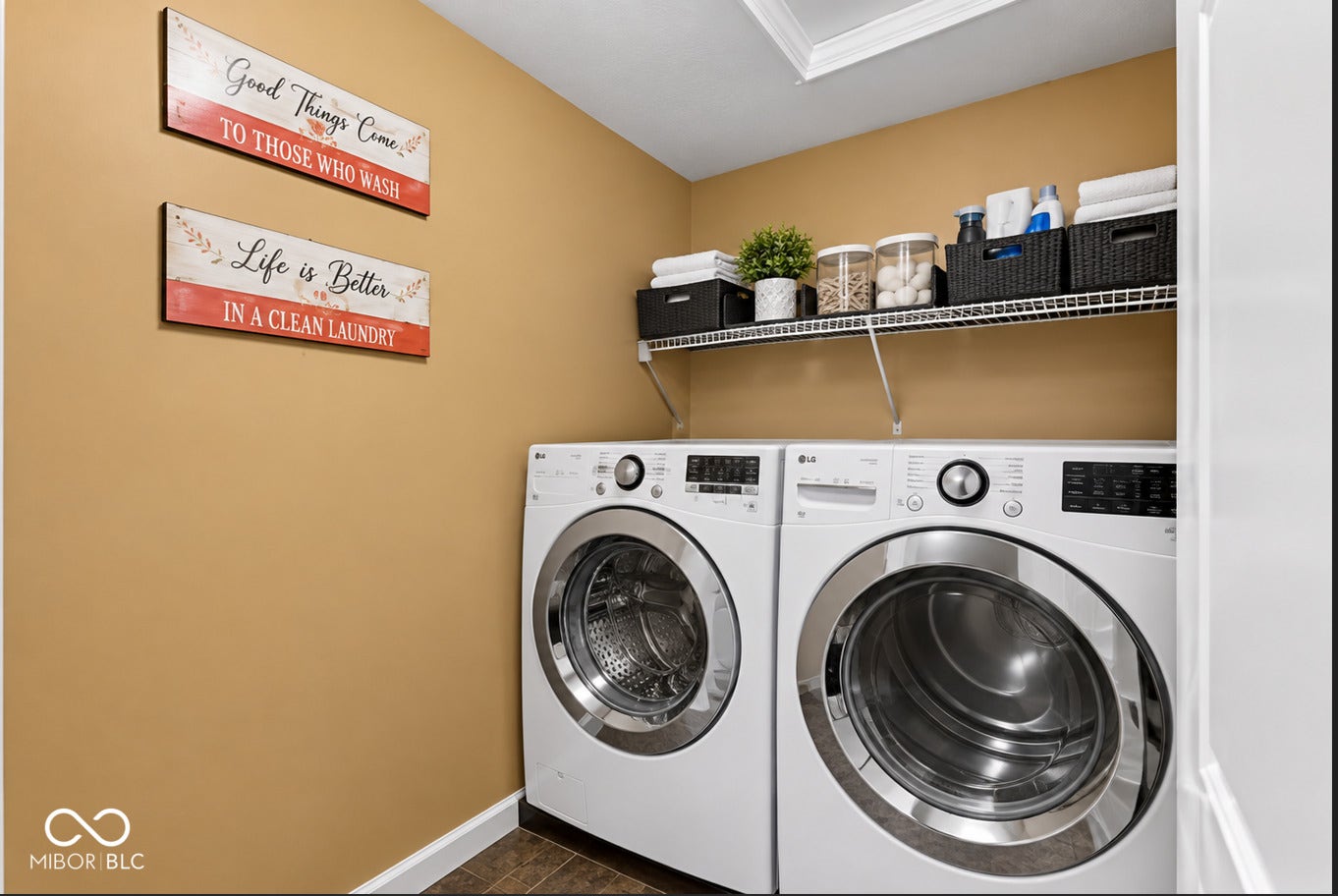 3394 S Bennett Drive, New Palestine, IN 46163 Front-loading washer and dryer set with wire shelving