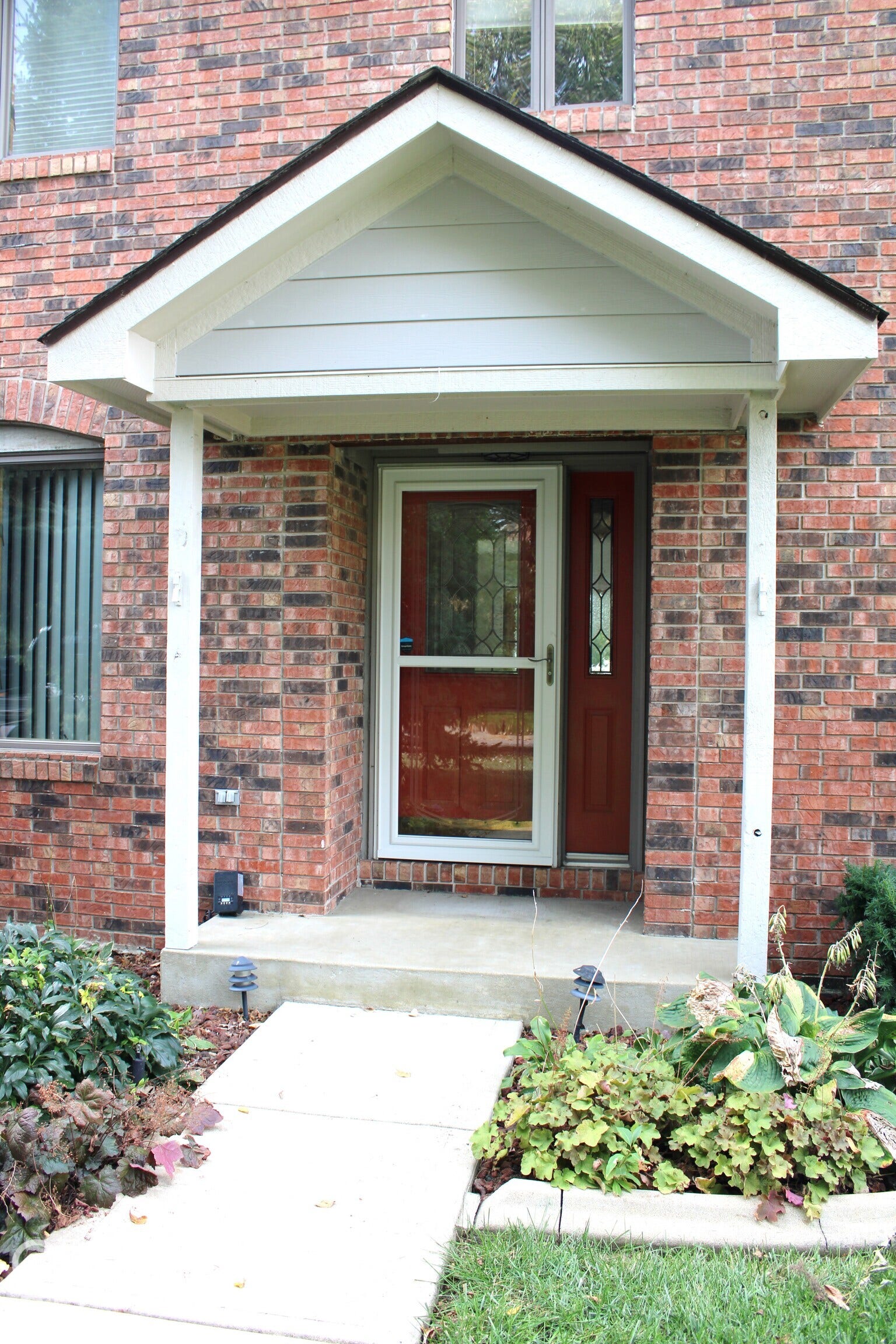 Covered Front Porch Entry To Welcome Family and Guests