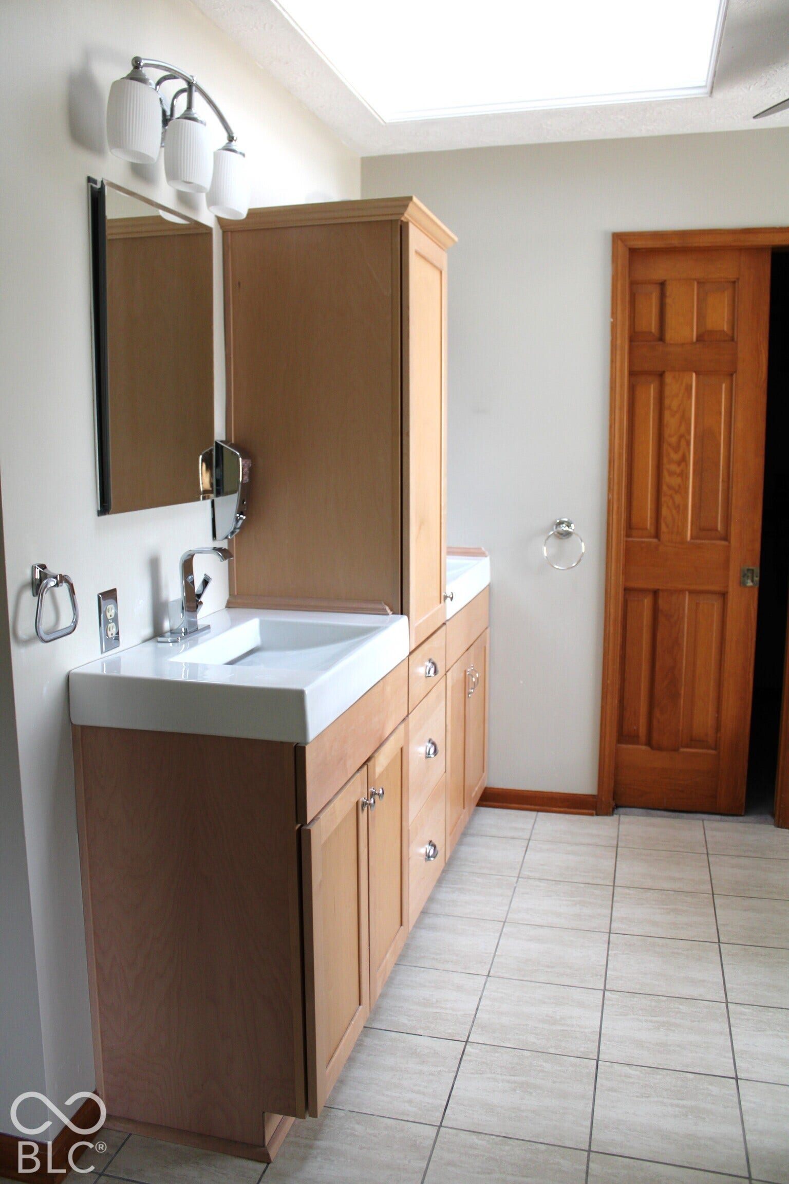 Double Vanities plus Skylight in Master and you will love the heated floors on cool morings