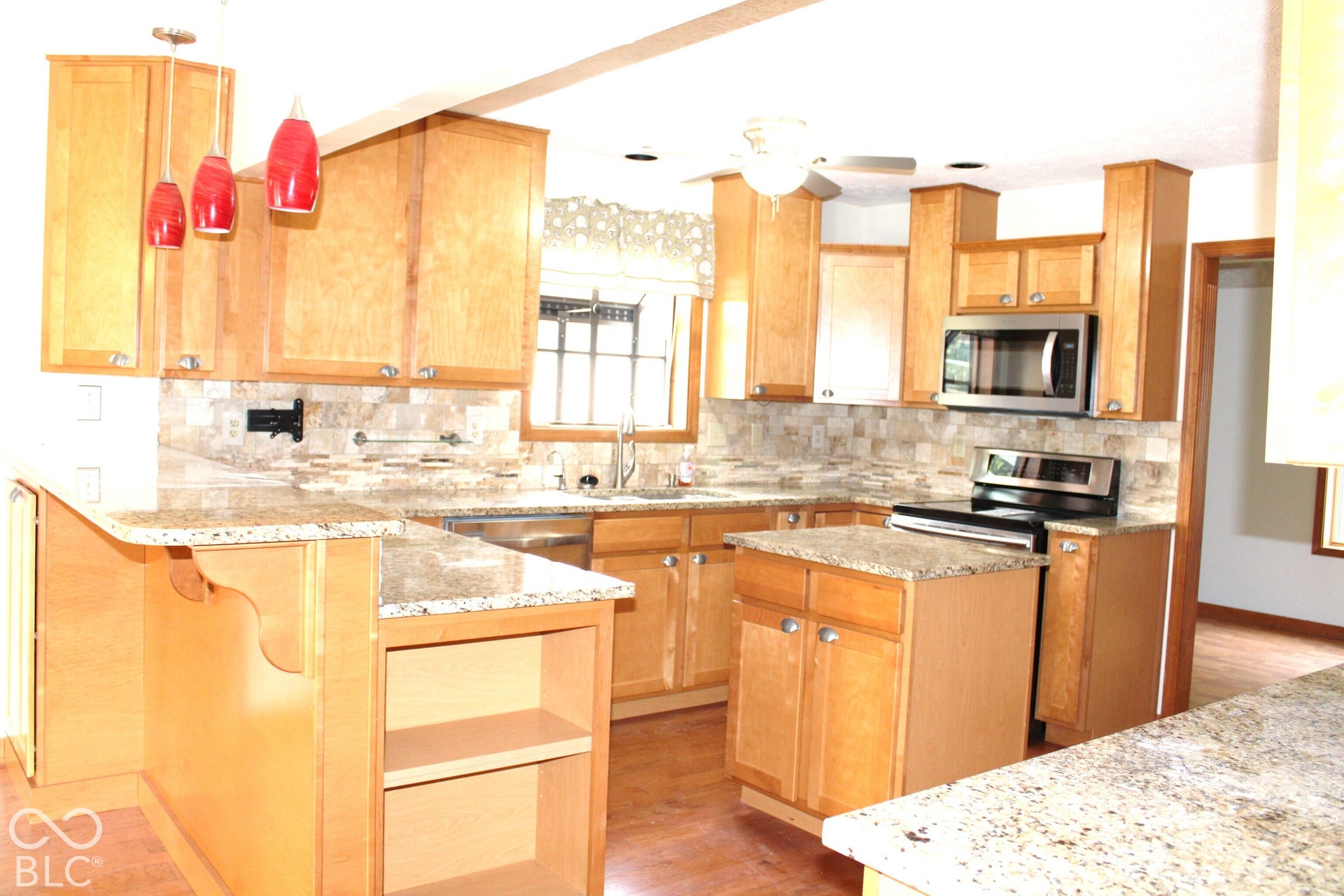 Kitchen with Granite Countertops and Maple Cabinetry