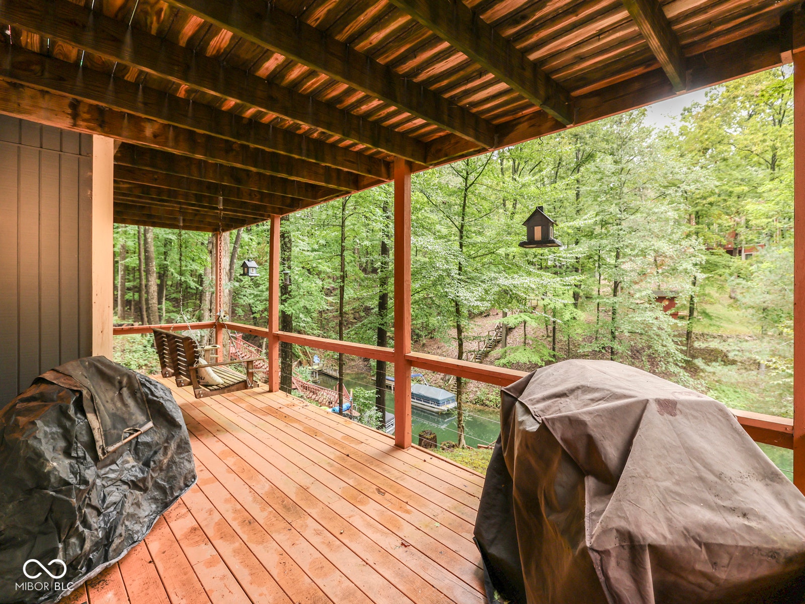Expansive wood deck with a natural wood-toned finish