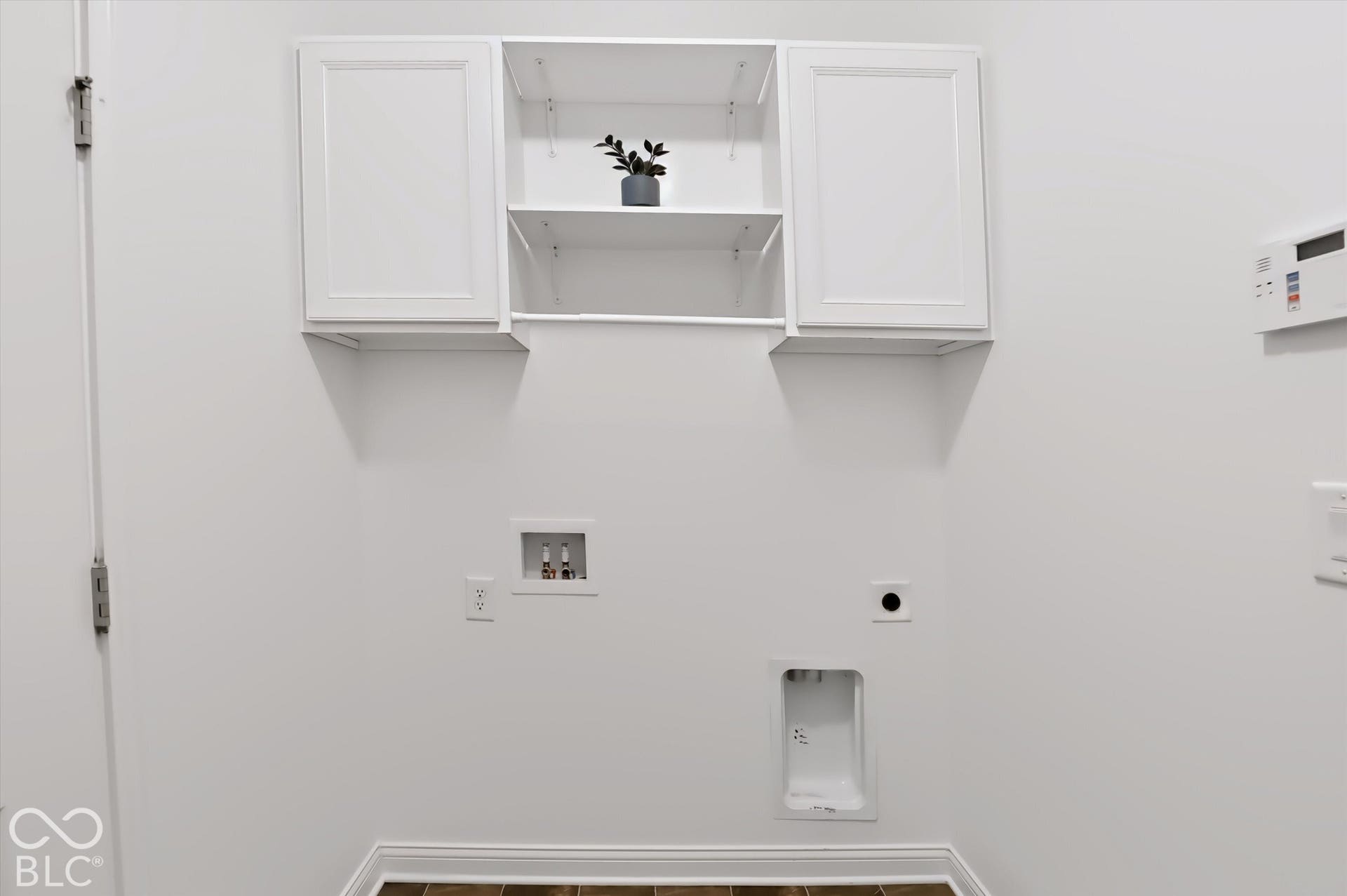6520 Coughlan Drive, Indianapolis, IN 46278 White wall-mounted cabinetry with open shelving