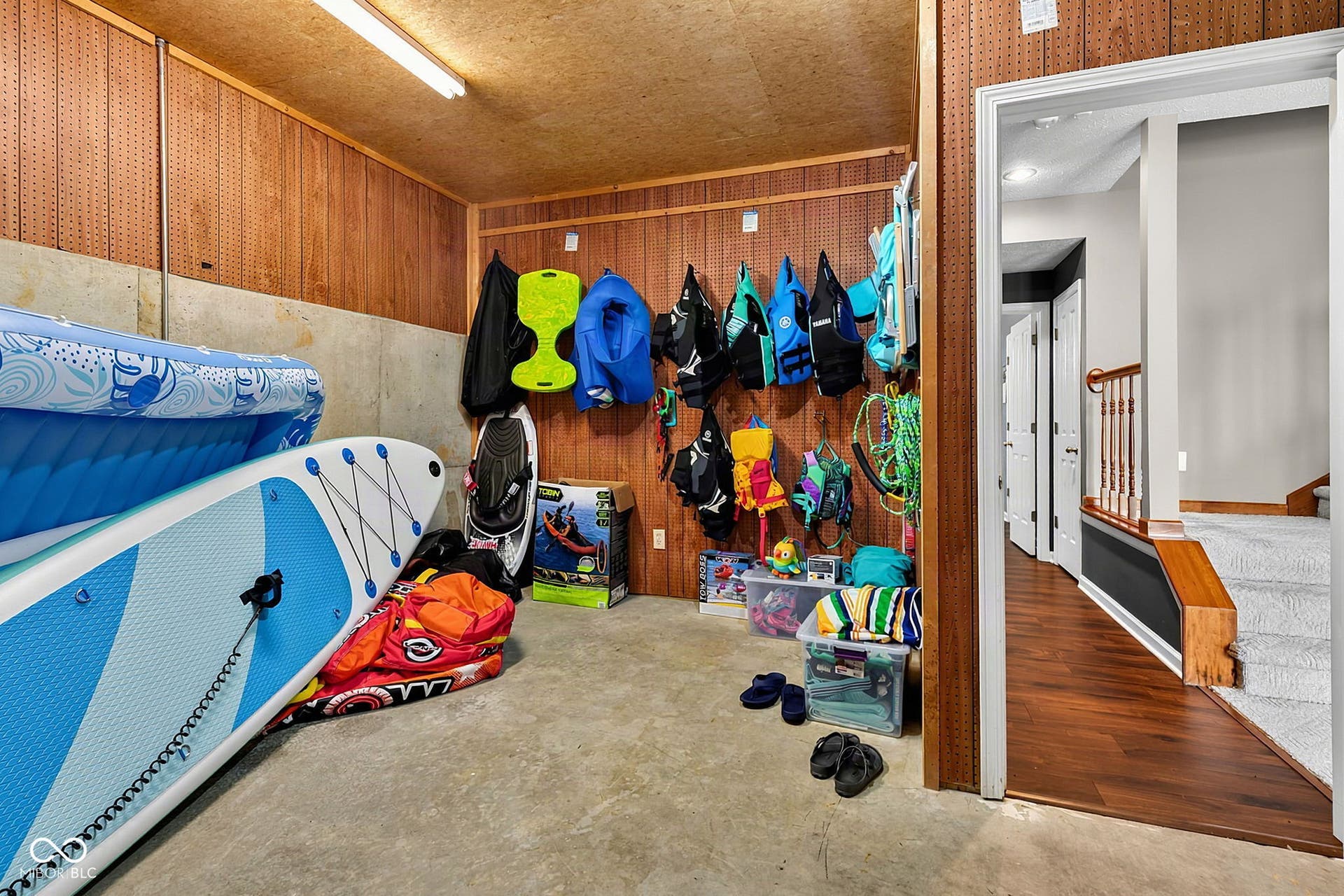 Basement storage for water toys and equipment.  Large doors lead to rear yard and lakefront for easy access.