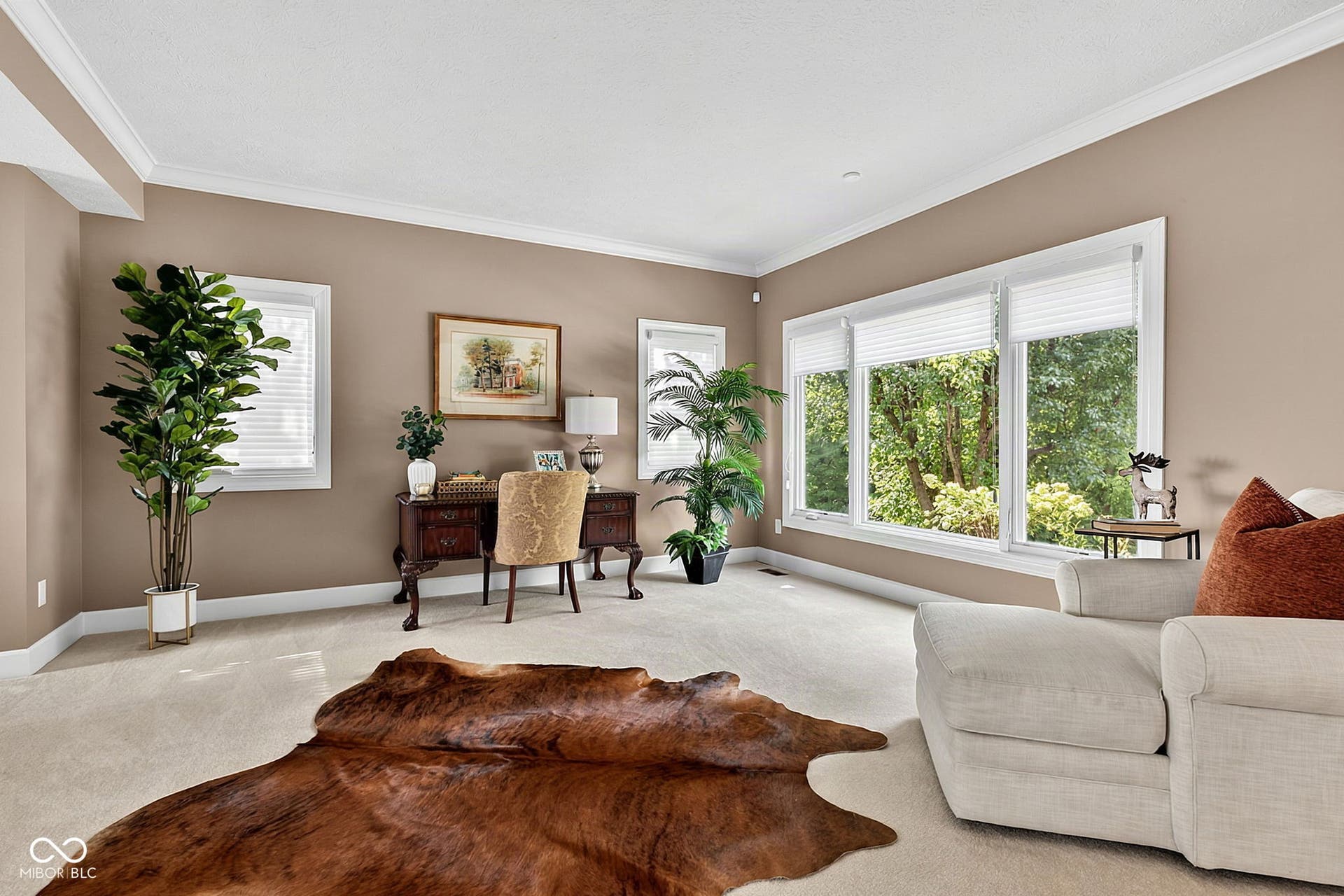 Living room with natural light and neutral tones.