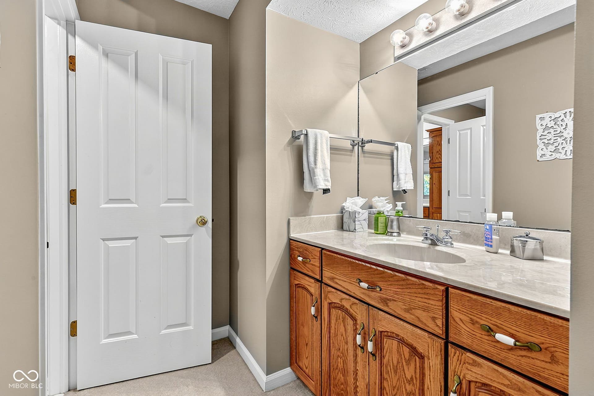 Full bath for bedrooms #3 and #4 - each with their own vanity.