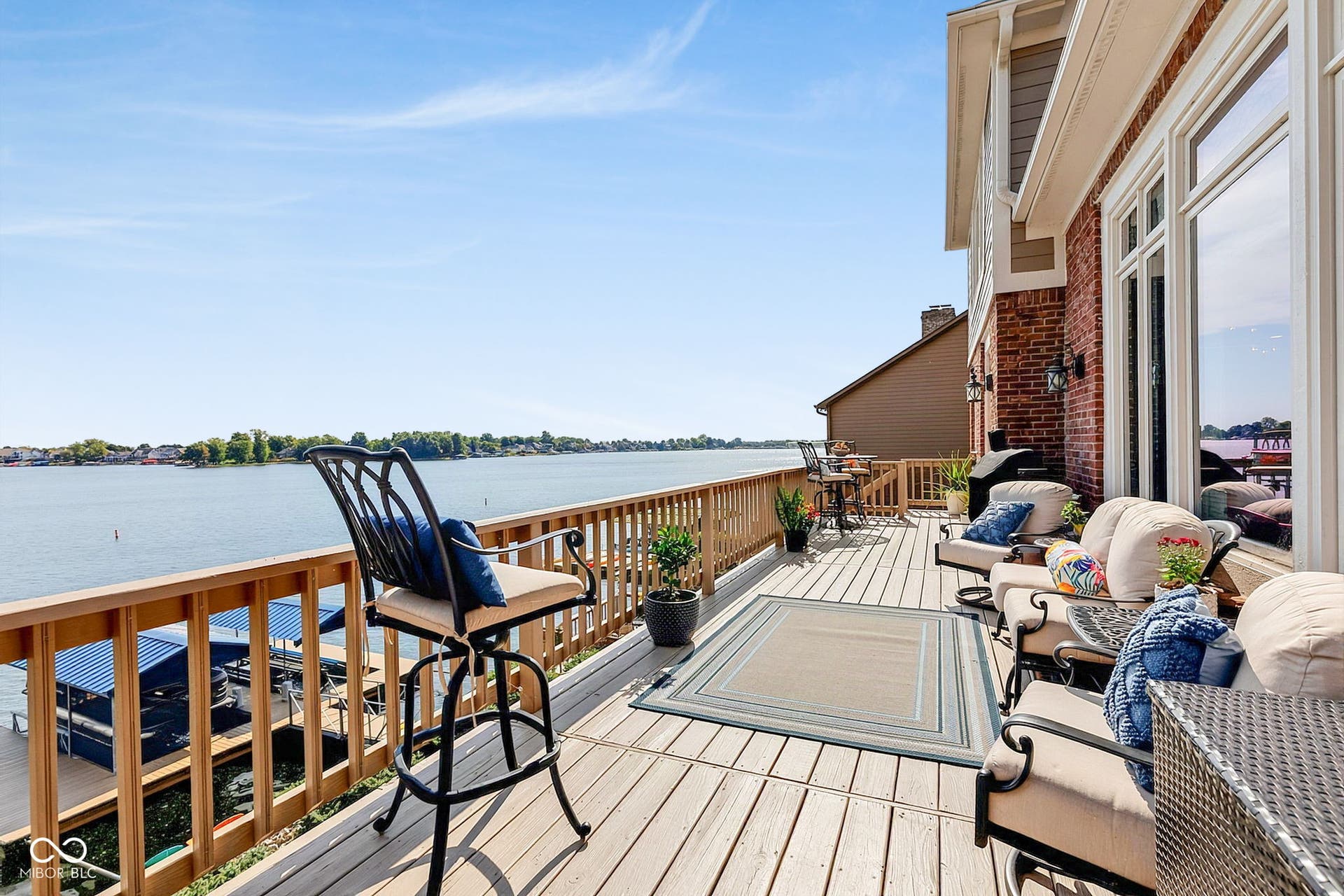Expansive outdoor deck from main level - easily accessible to kitchen.