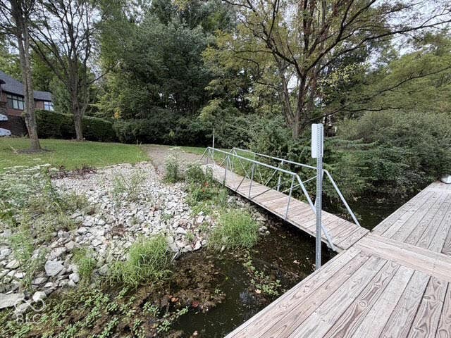 Wood-finish dock with an attached gangway