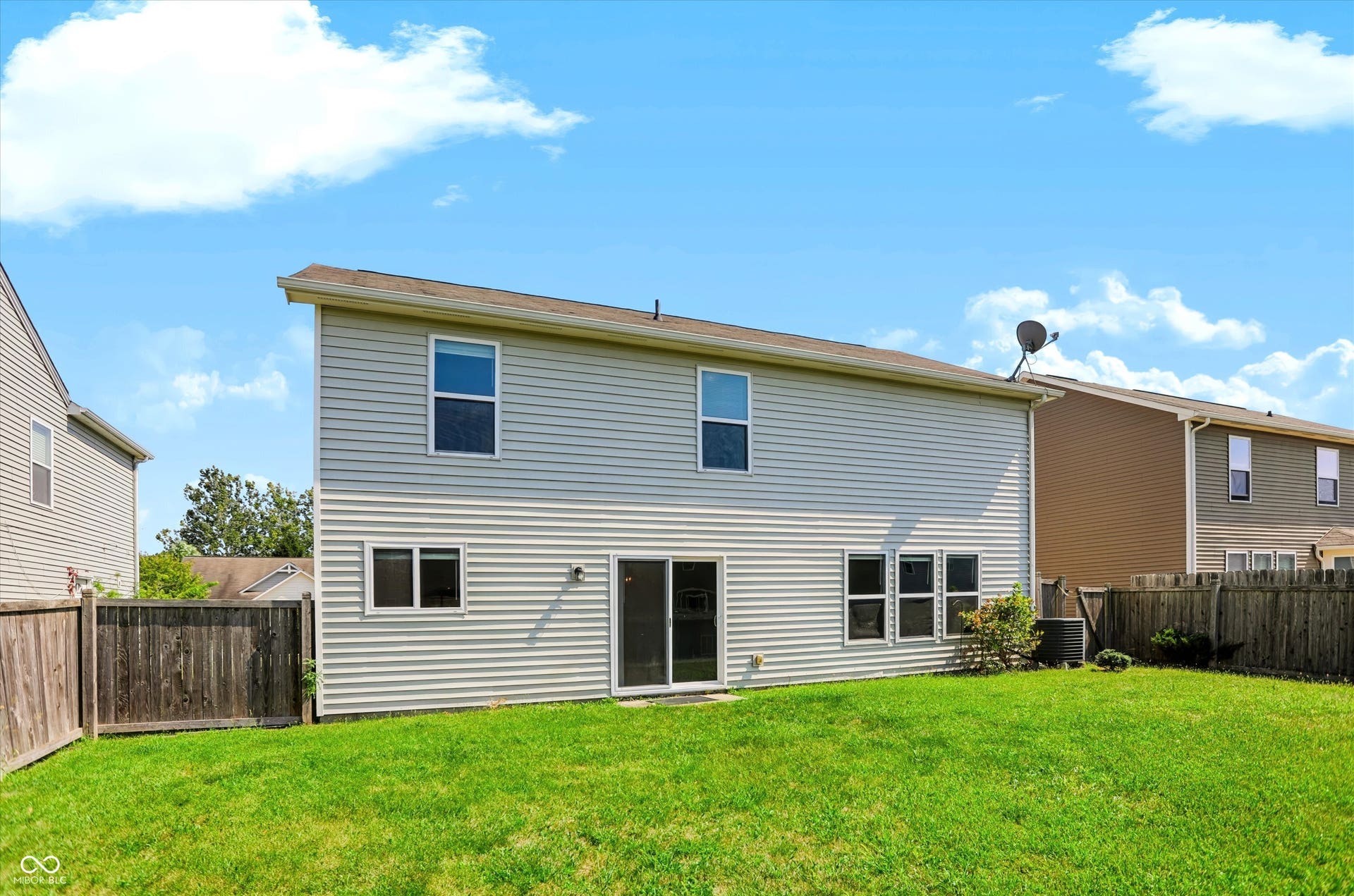 2536 Autumn Road, Indianapolis, IN 46229 Expansive grass lawn with privacy fencing