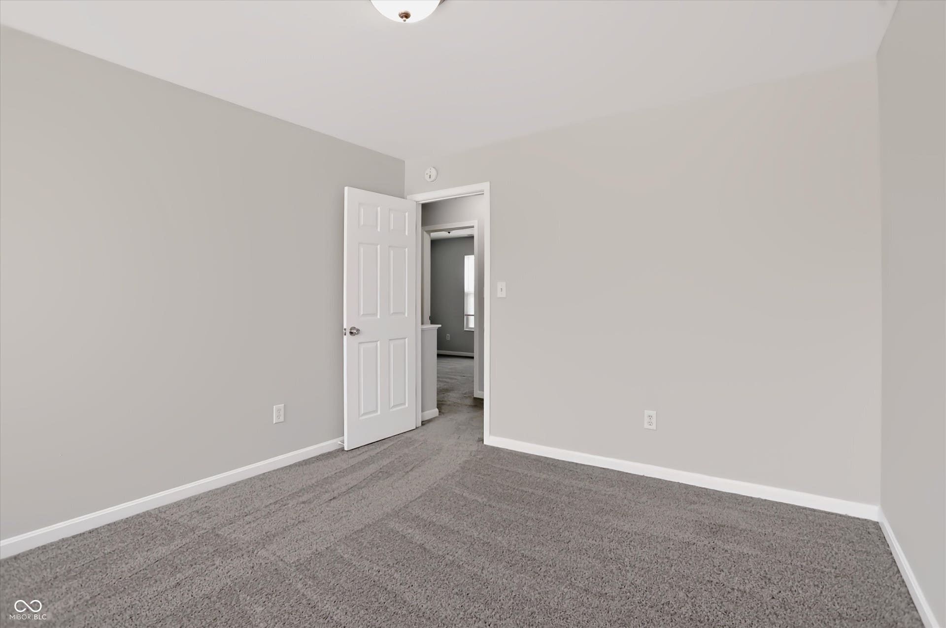 2536 Autumn Road, Indianapolis, IN 46229 Neutral wall paint, textured carpeting, and white trim