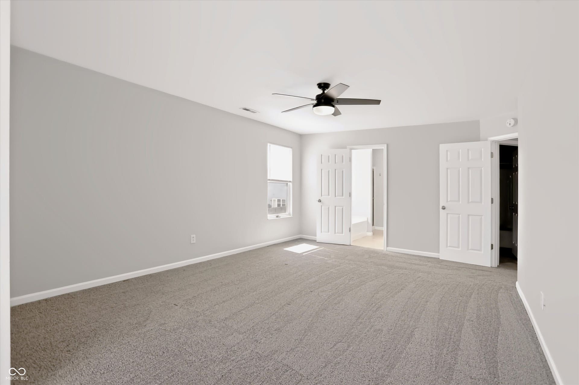 2536 Autumn Road, Indianapolis, IN 46229 Spacious room with light gray carpeting and light gray wall paint