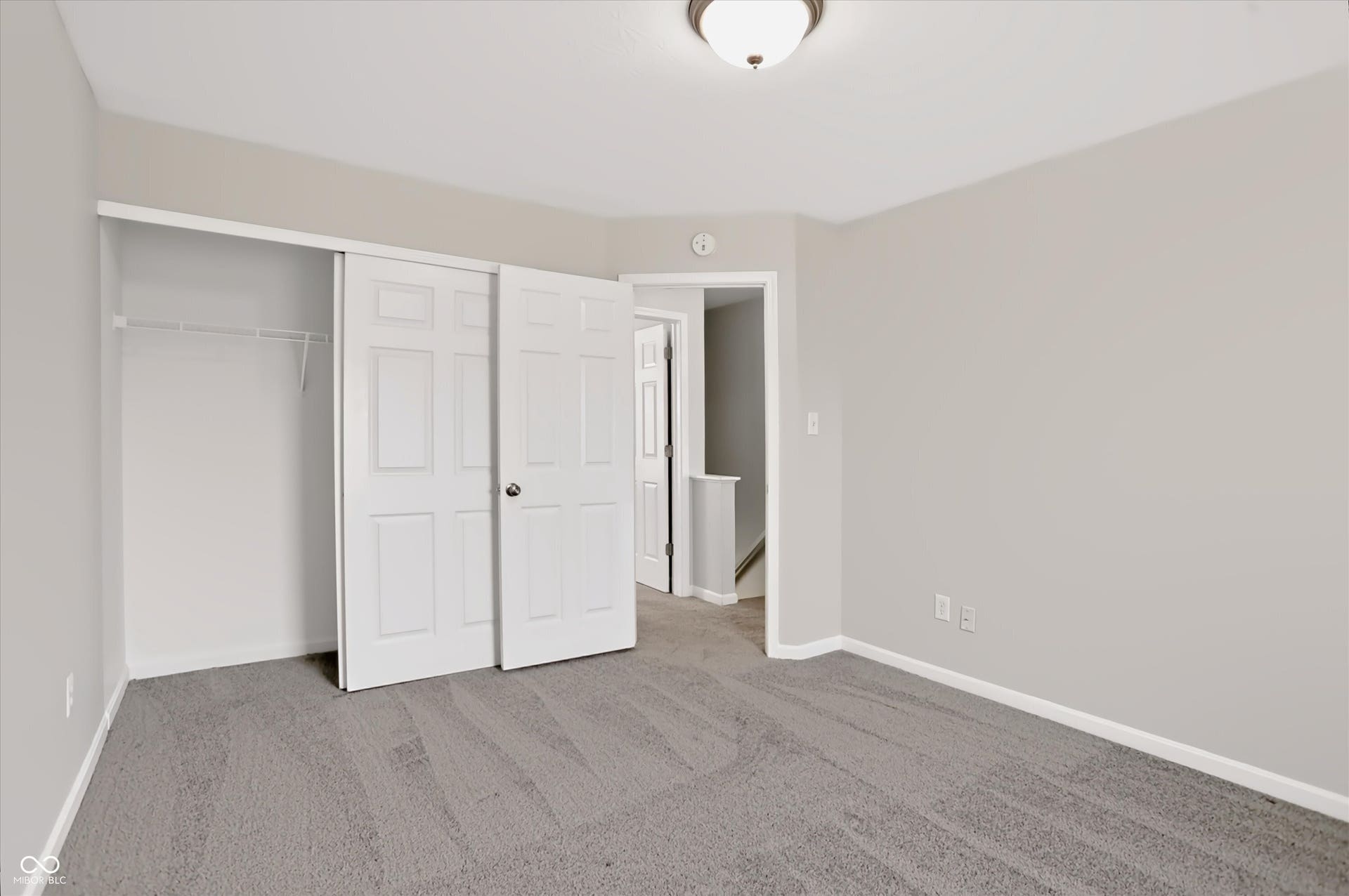 2536 Autumn Road, Indianapolis, IN 46229 Neutral tone wall paint with gray carpet flooring