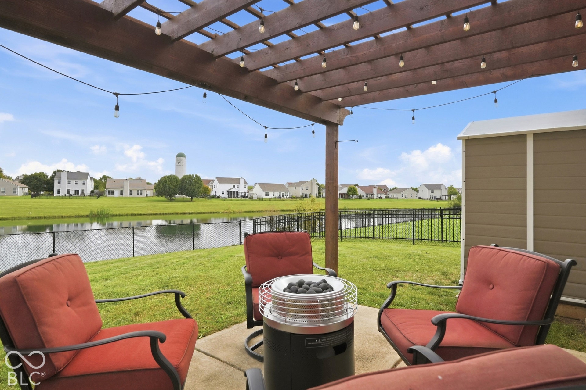 Spacious patio with a wood pergola