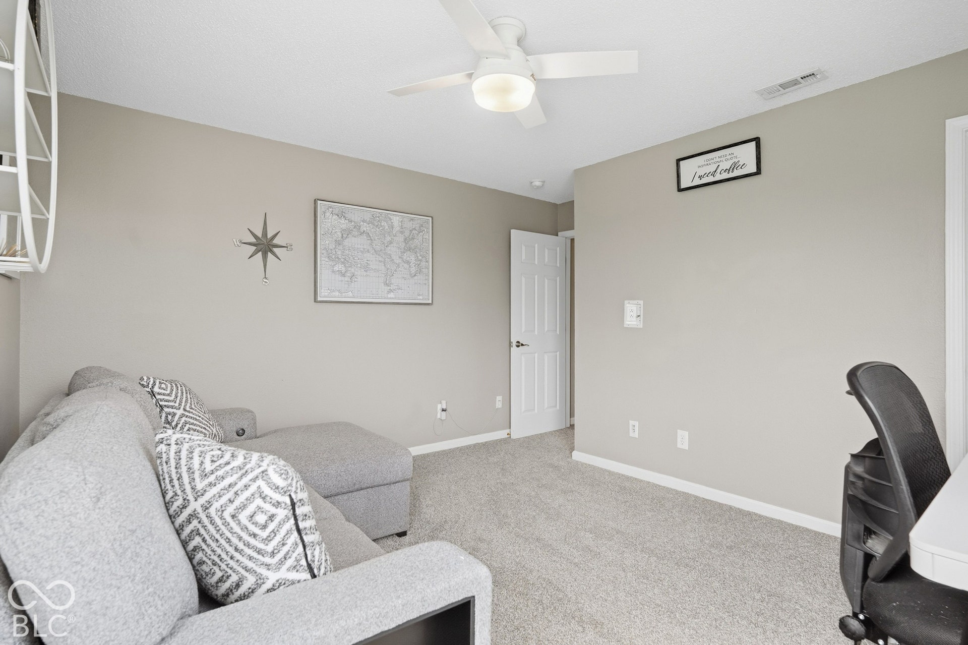 Neutral wall color with wall-to-wall carpeting