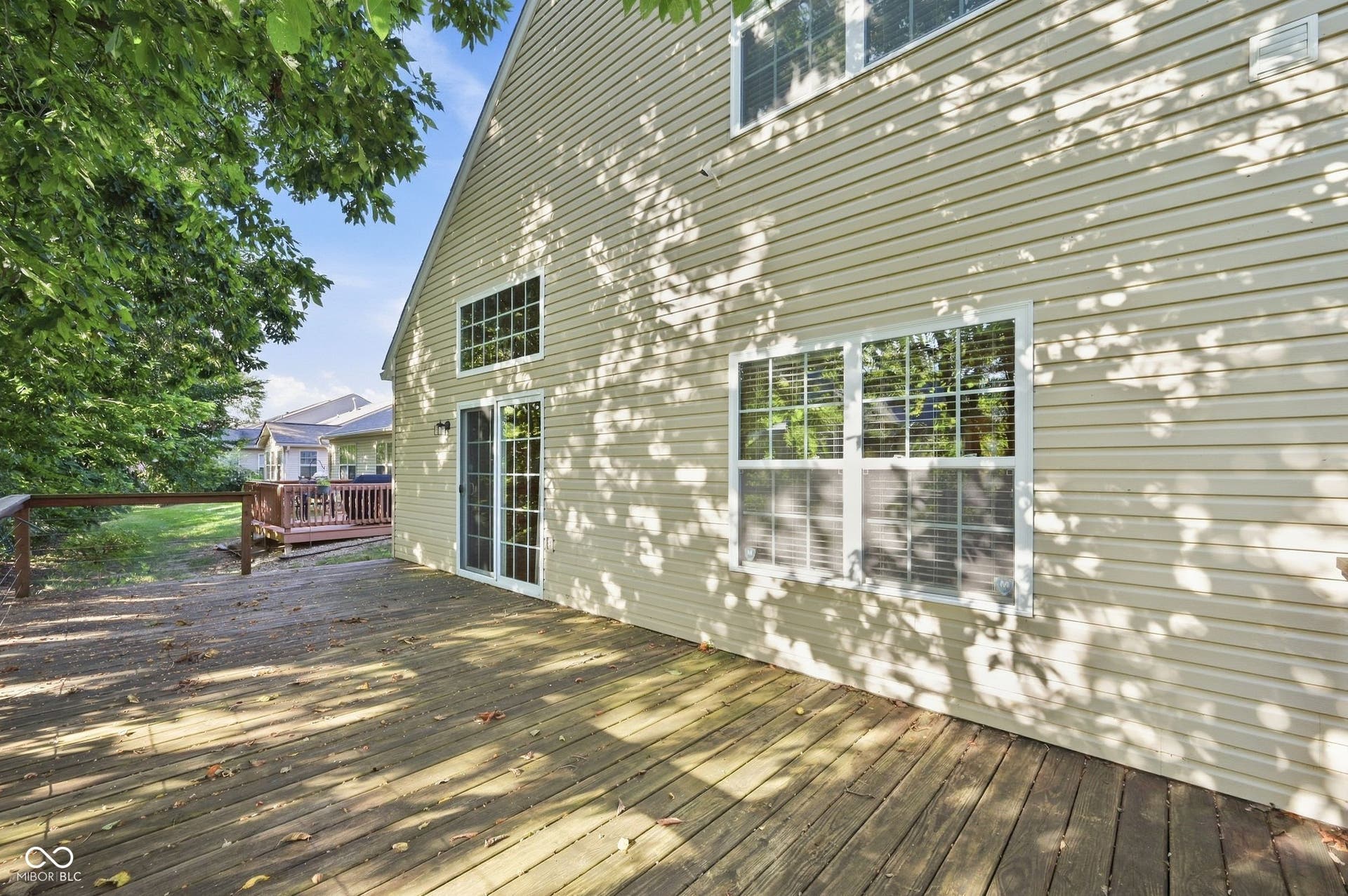 2743 Rylee Court, Greenwood, IN 46143 Wood-finish deck with a wood railing, very private