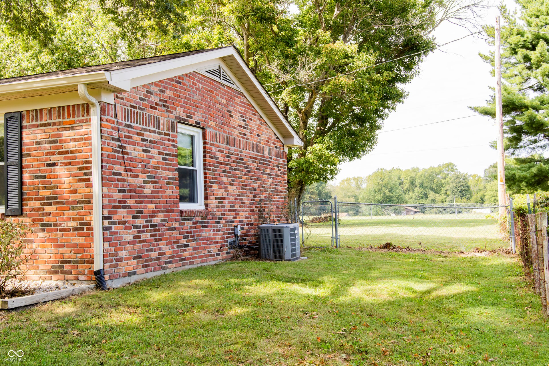 Brick exterior with white window trim
