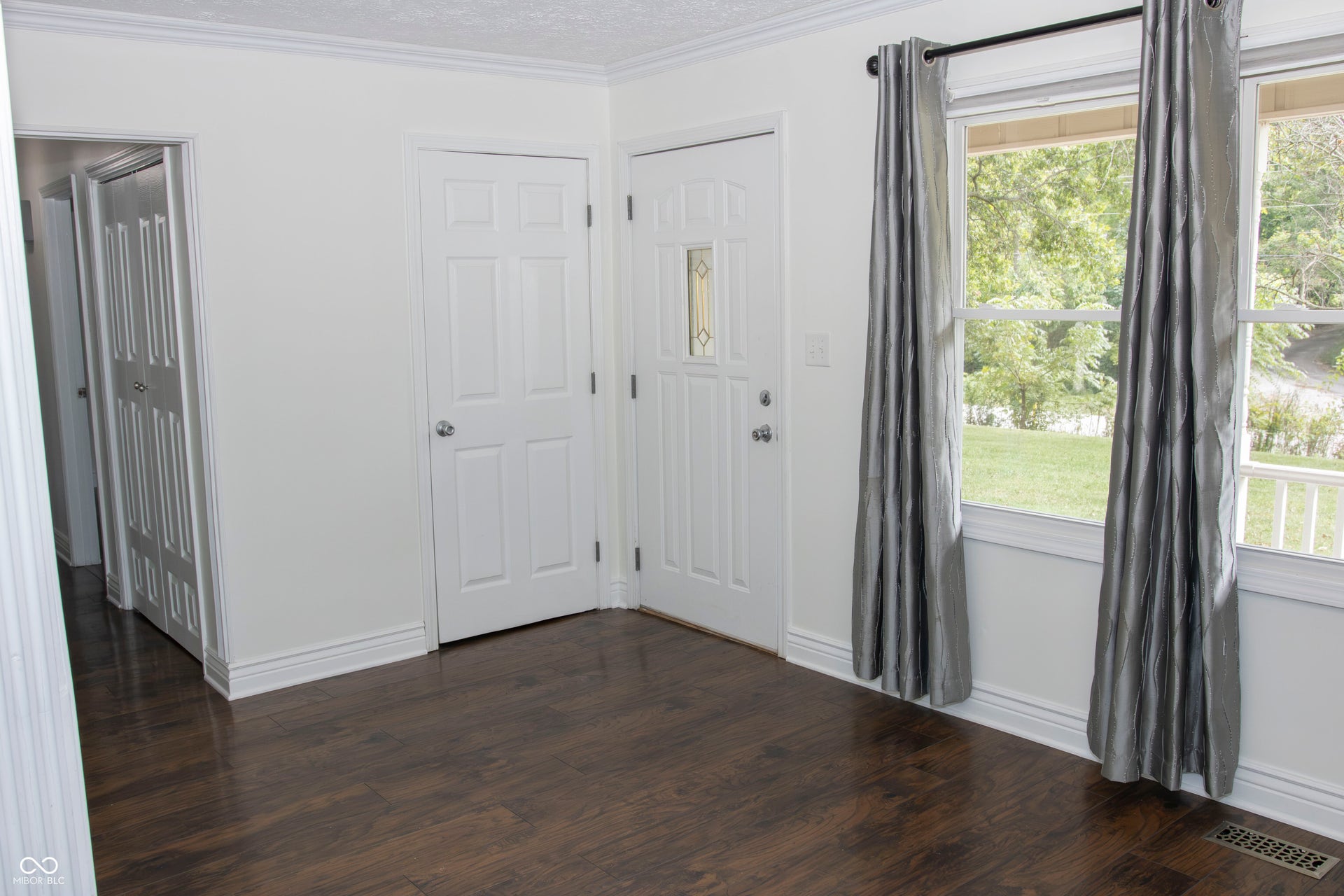 Hardwood-style flooring throughout