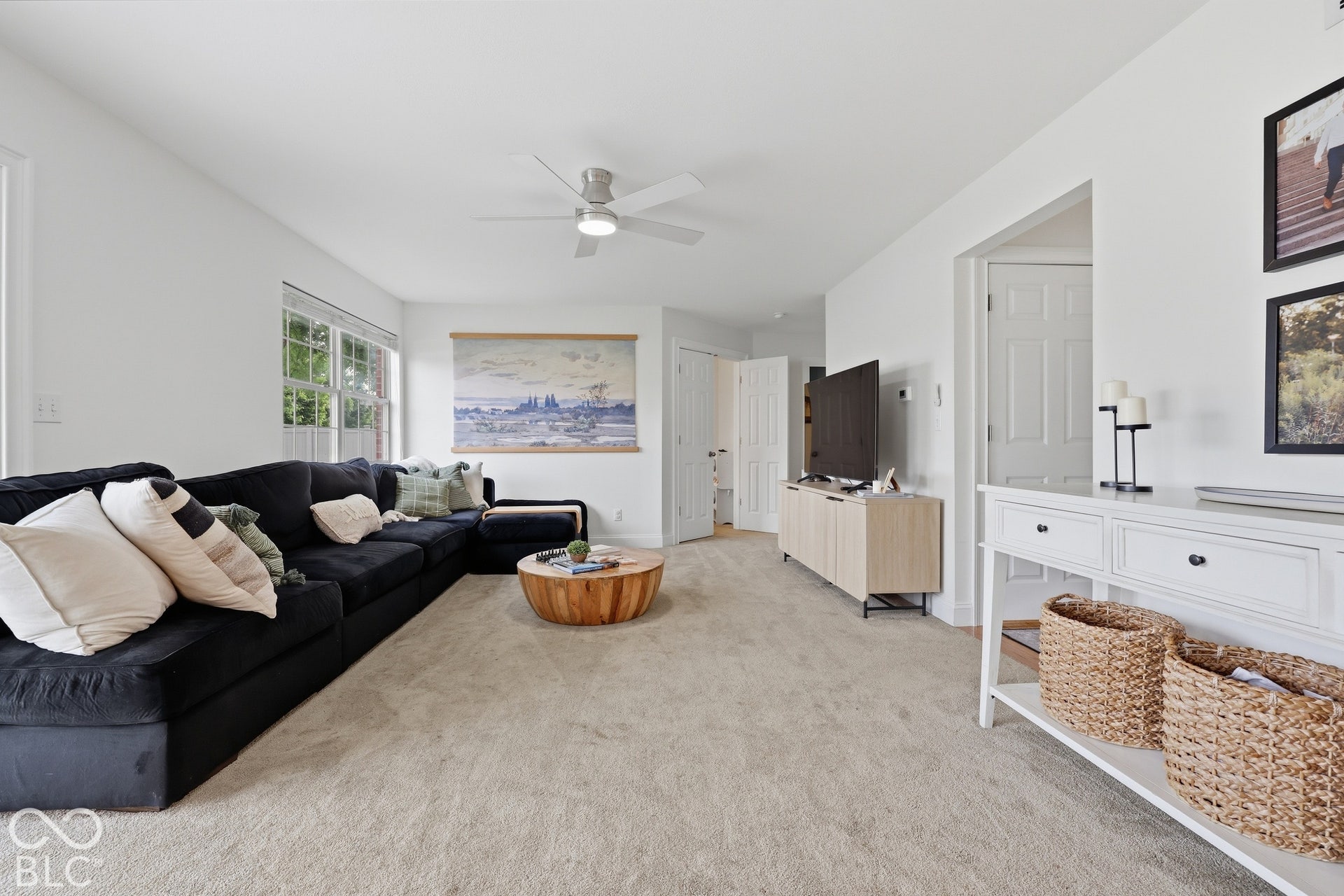 Just off the kitchen, the 18x21 living room offers plenty of space to settle in and relax. Its open connection to the kitchen keeps everyone together, while windows overlooking the backyard bring in natural light.