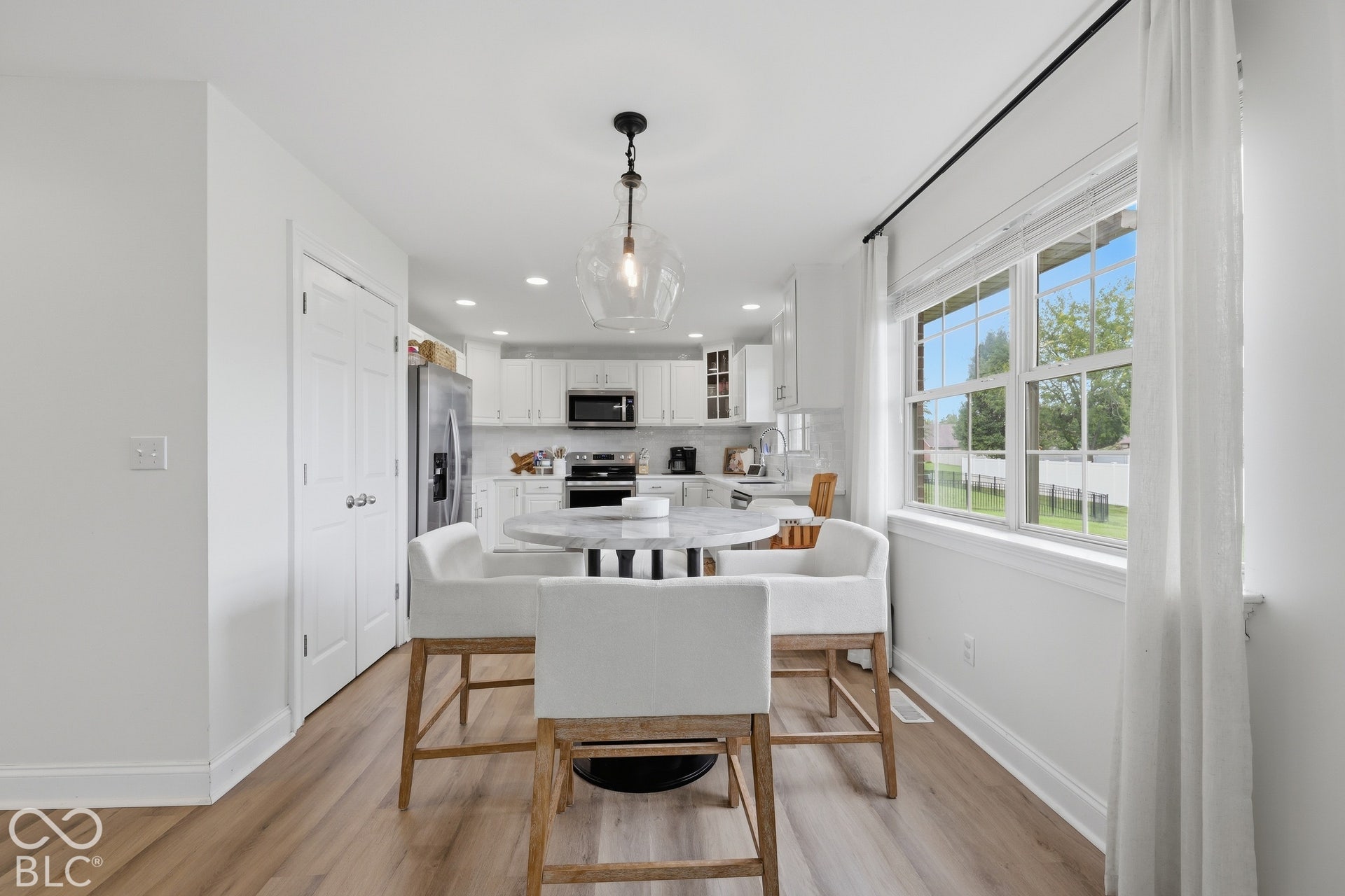 10x12 breakfast nook sits between the updated kitchen and living room, offering a comfortable spot to start your mornings.