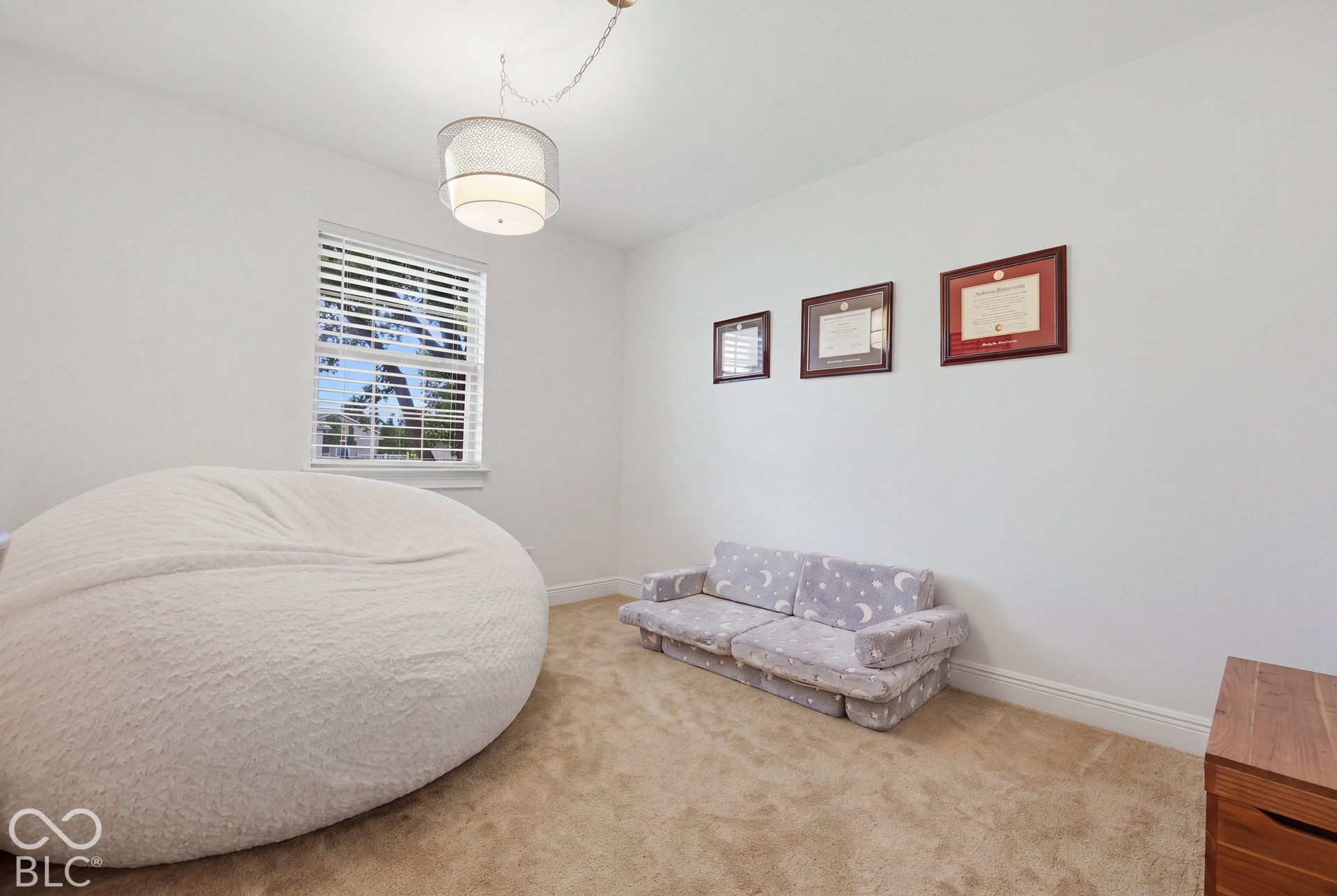 Just off the living room, this 10x12 bonus room offers flexible space for a bedroom, home office, playroom, or sitting room.