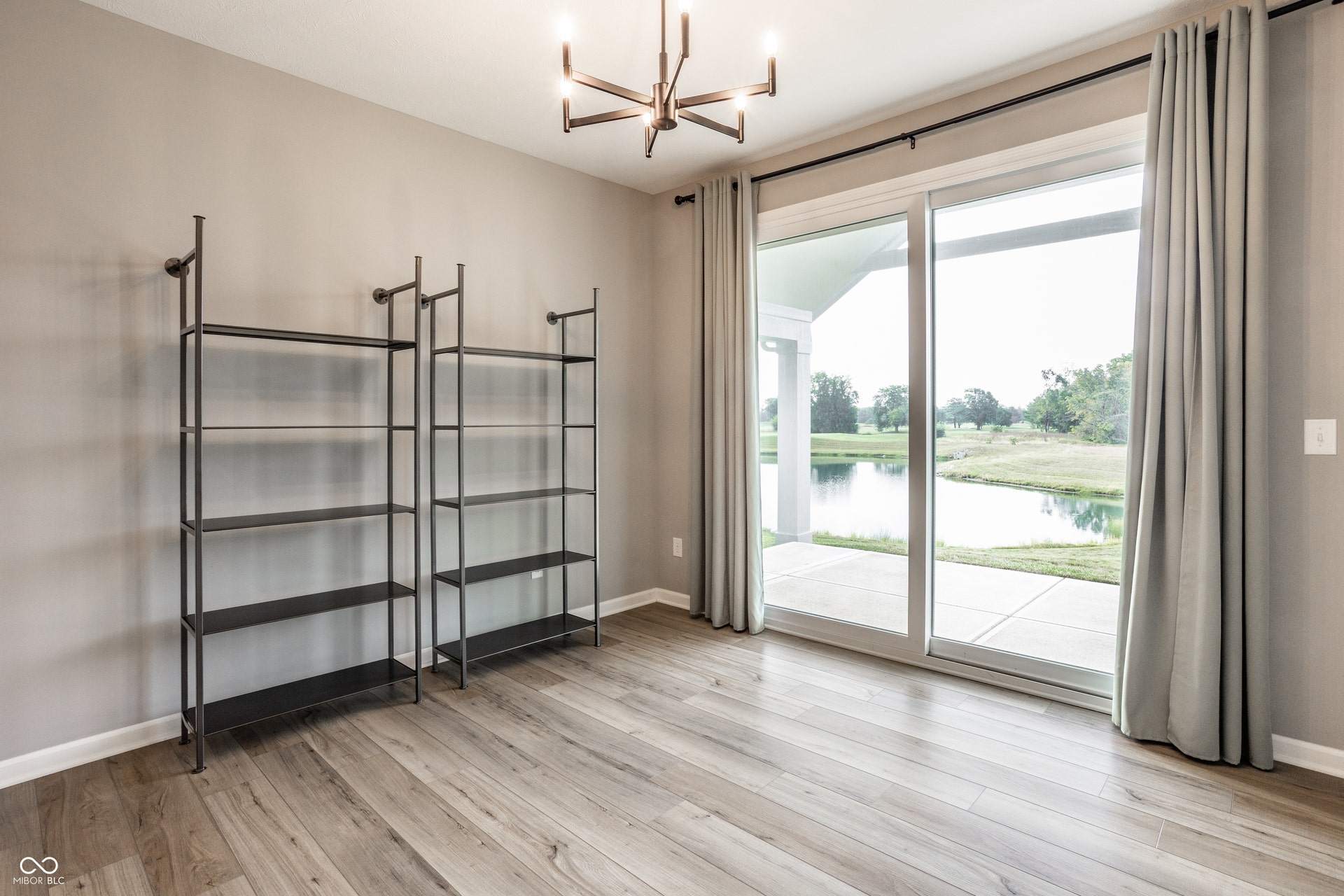 Den, Library, Office, Sun Room, whatever you choose to make this room, you will have a beautiful view of the pond and golf course!