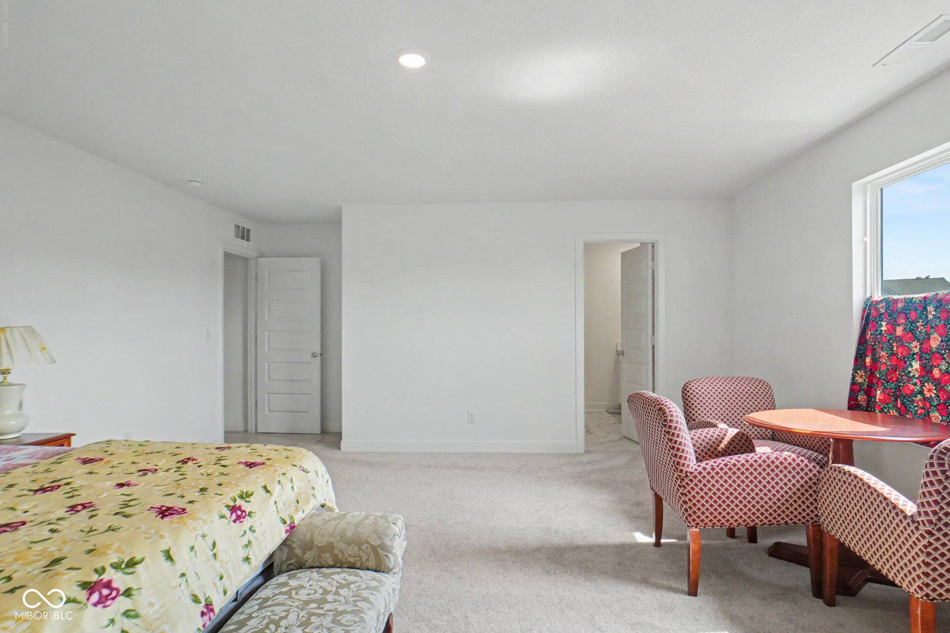 4357 Red Pine Drive, Bargersville, IN 46106 Recessed lighting, light-toned carpet flooring, a white window frame, and two panel doors