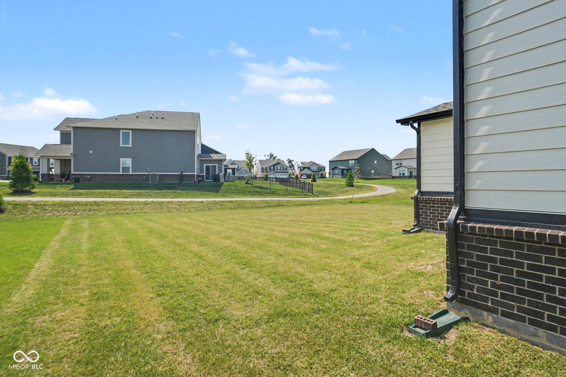 4357 Red Pine Drive, Bargersville, IN 46106 Expansive green space with a paved walking path