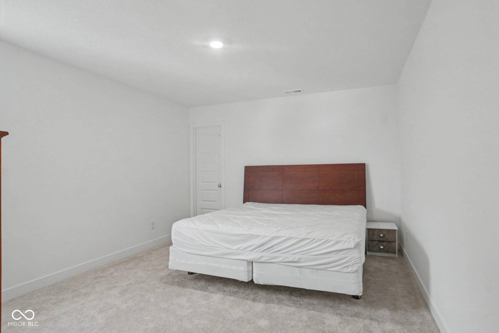 4357 Red Pine Drive, Bargersville, IN 46106 Plush carpeting, bright white walls, and a recessed ceiling light fixture
