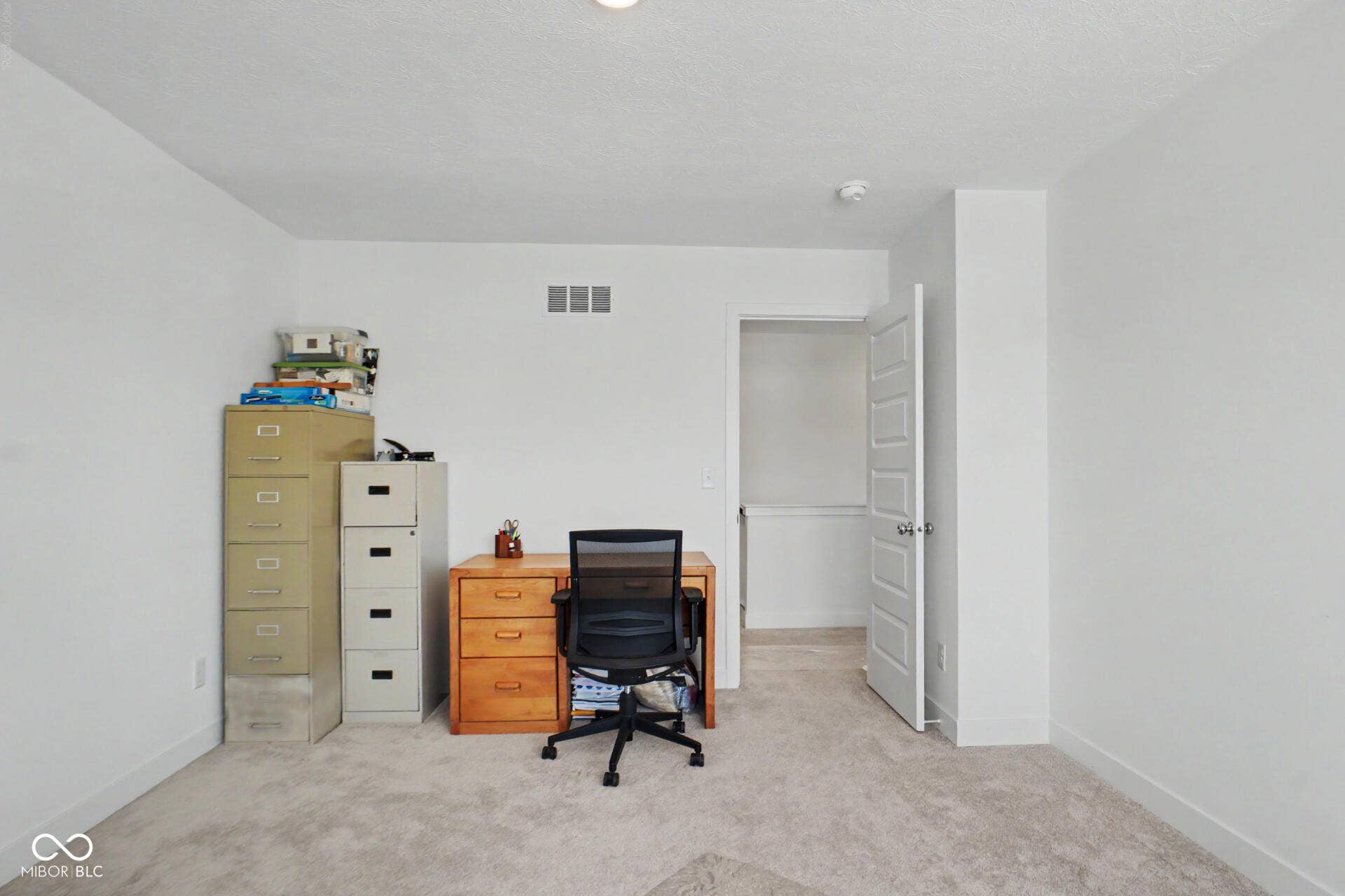 4357 Red Pine Drive, Bargersville, IN 46106 Carpeted room with white walls, a recessed ceiling light, and an open doorway