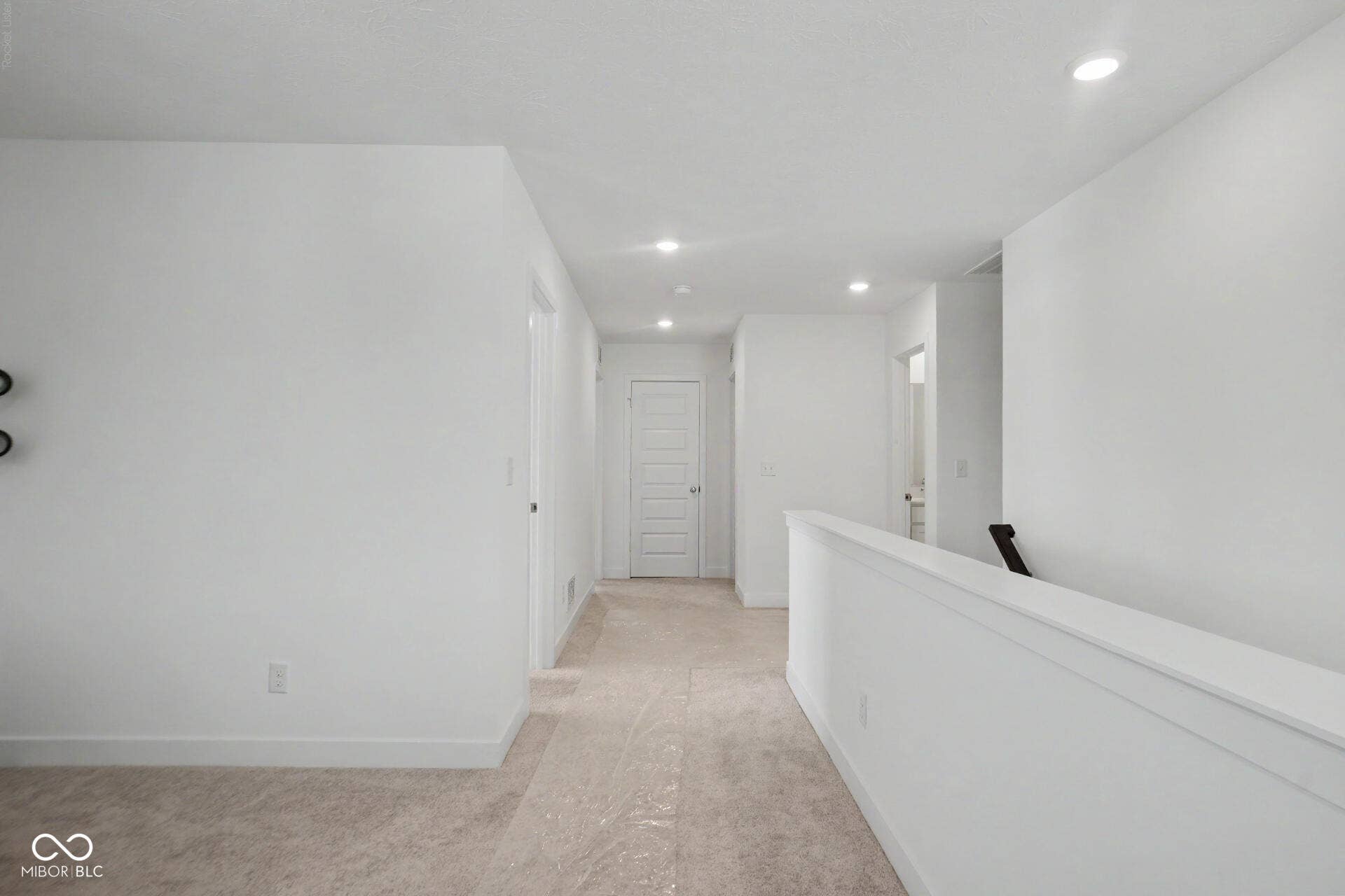 4357 Red Pine Drive, Bargersville, IN 46106 Recessed ceiling lighting illuminates the hallway and landing with neutral carpeting, white walls, and white trim
