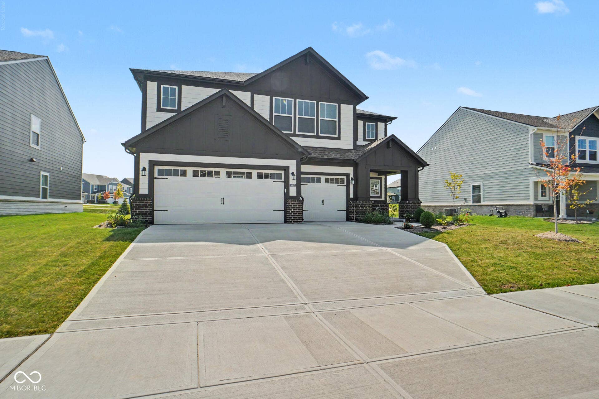 4357 Red Pine Drive, Bargersville, IN 46106 Two-story exterior with dark siding accents, white trim, and a covered entry