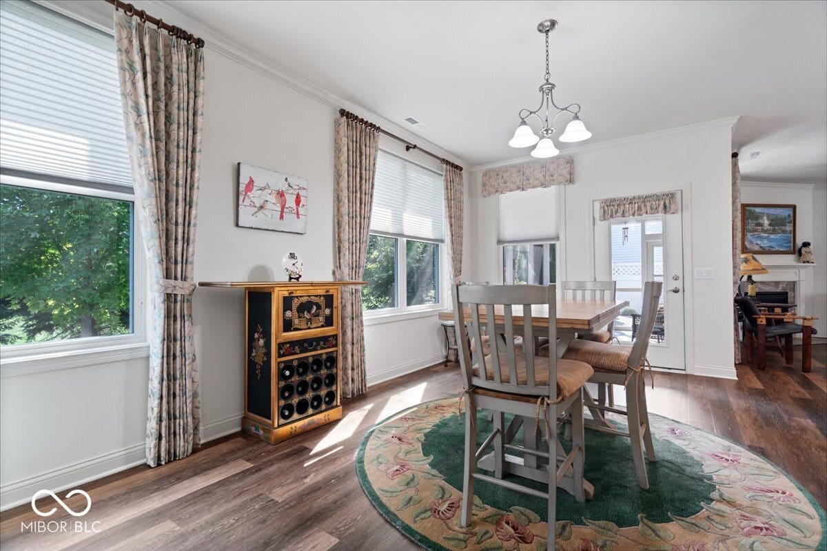 The nook leads out to the three season room, with a private backyard and not overlooked