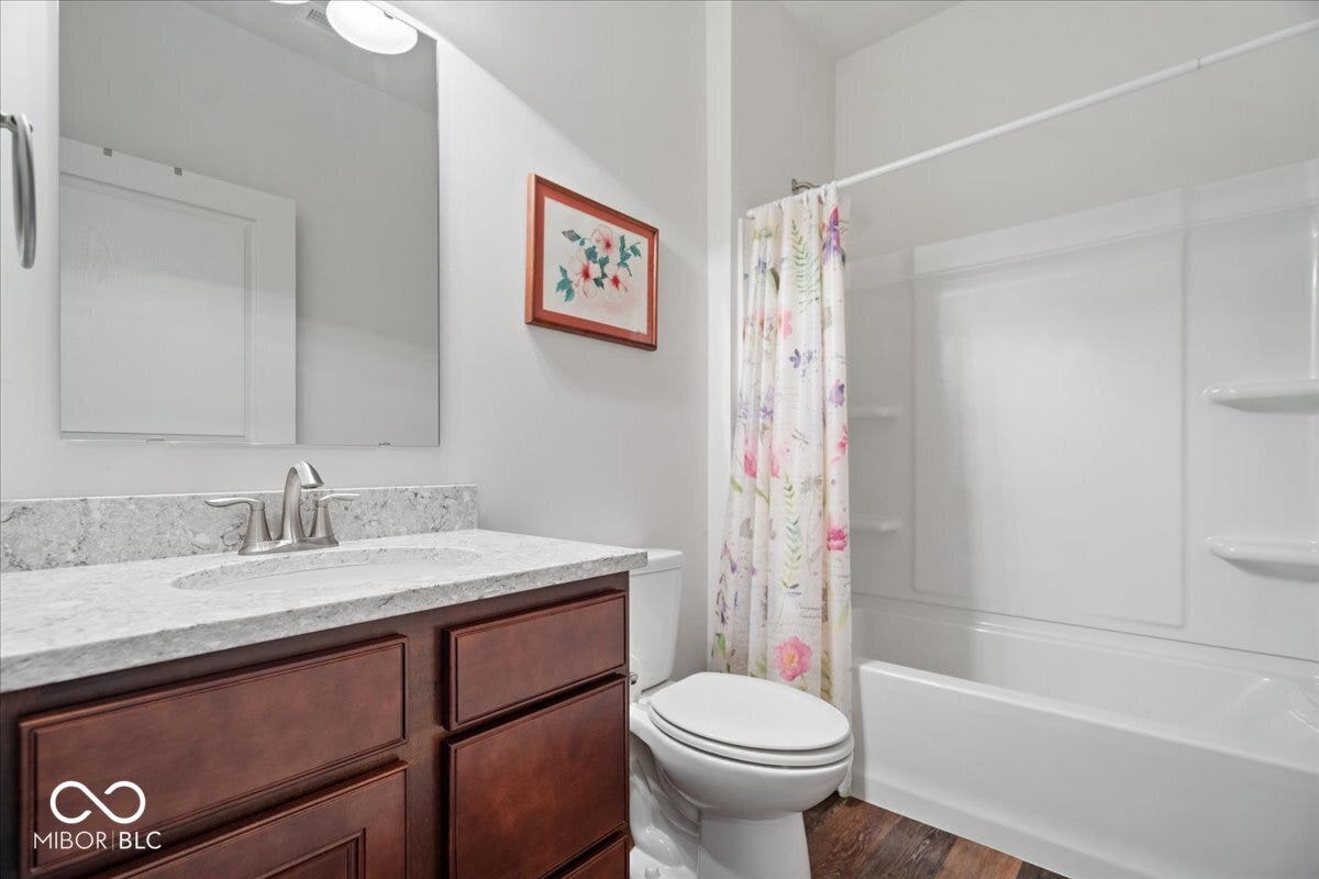 The second bathroom is located between bedrooms 2 & 3