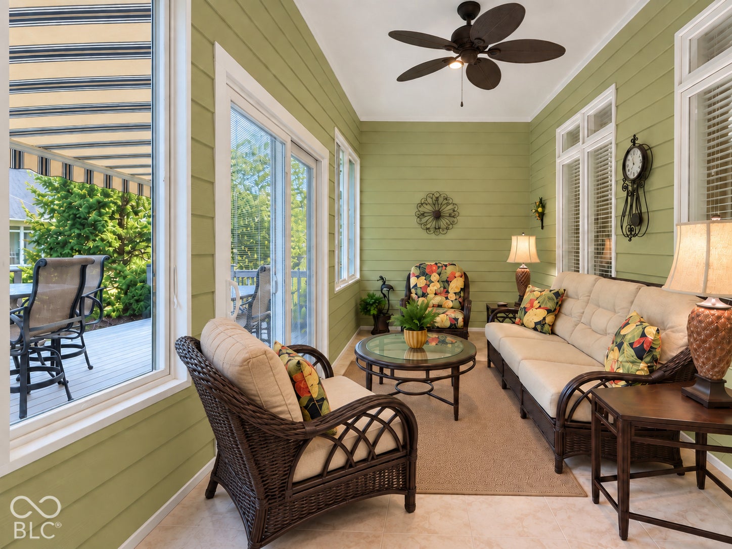 Sunroom- featuring year-round enjoyment with views onto deck and backyard.