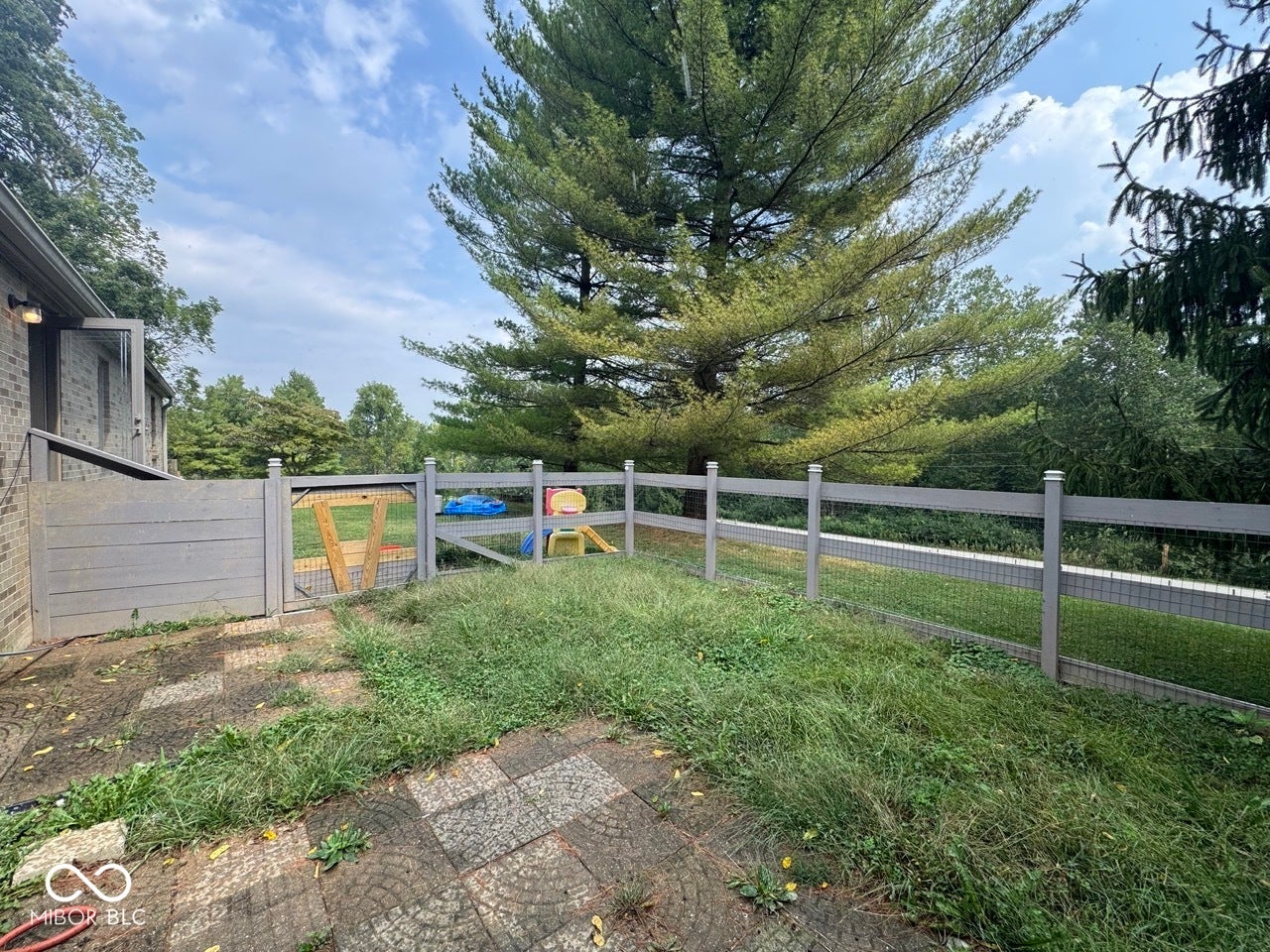 Fence subsection that could be play area for younger kids