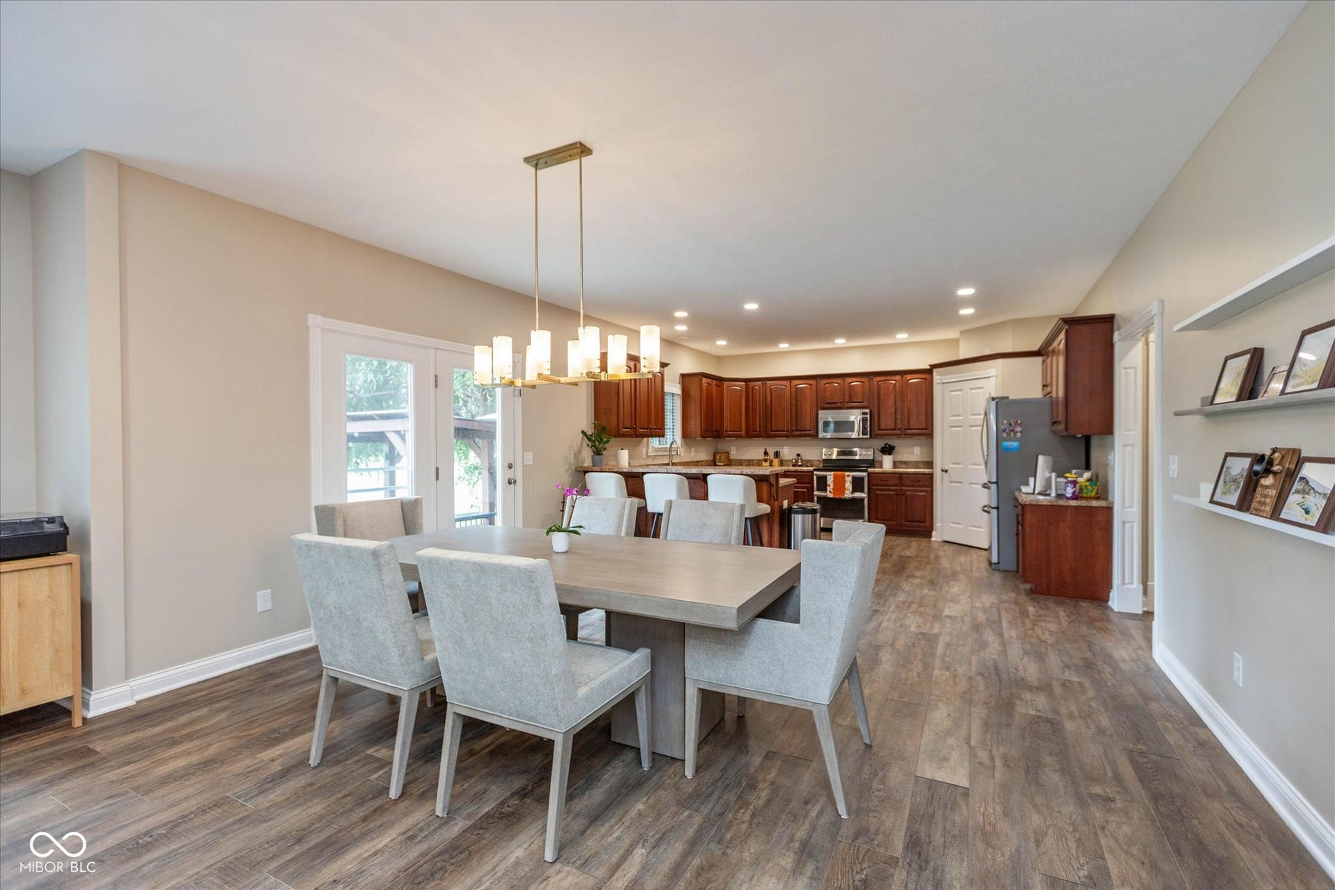 1513 Tottenham, Danville, IN 46122 Wood-finish flooring, recessed lighting, and a modern chandelier