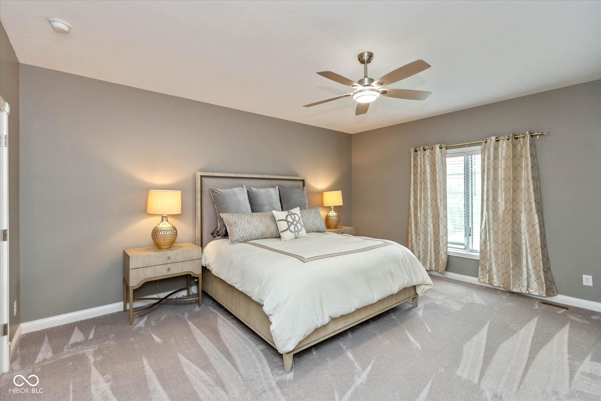 1513 Tottenham, Danville, IN 46122 Carpeted room with a ceiling fan light fixture, light gray walls, and a window with blinds