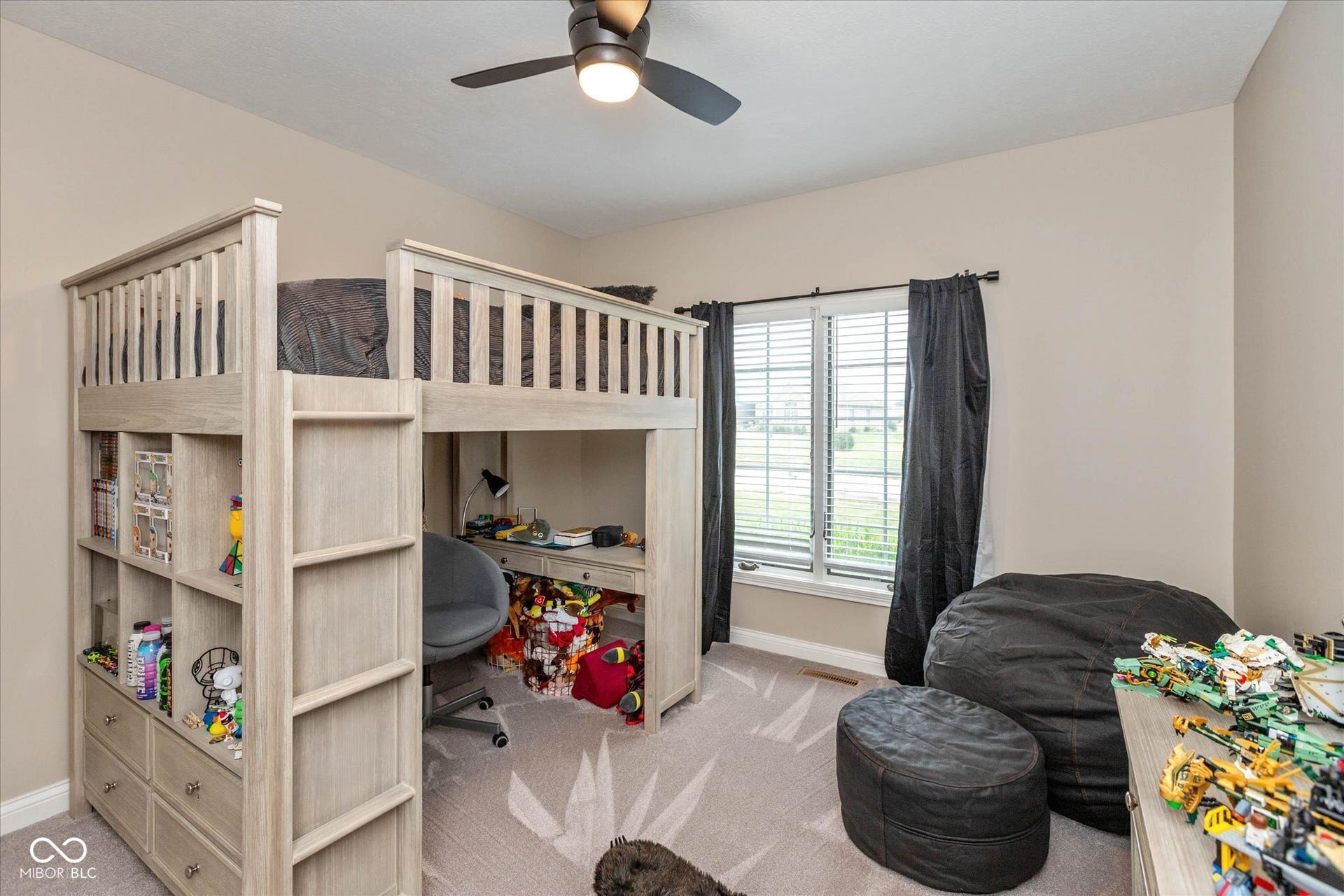 1513 Tottenham, Danville, IN 46122 Built-in wood-finish loft bed with integrated shelving and desk