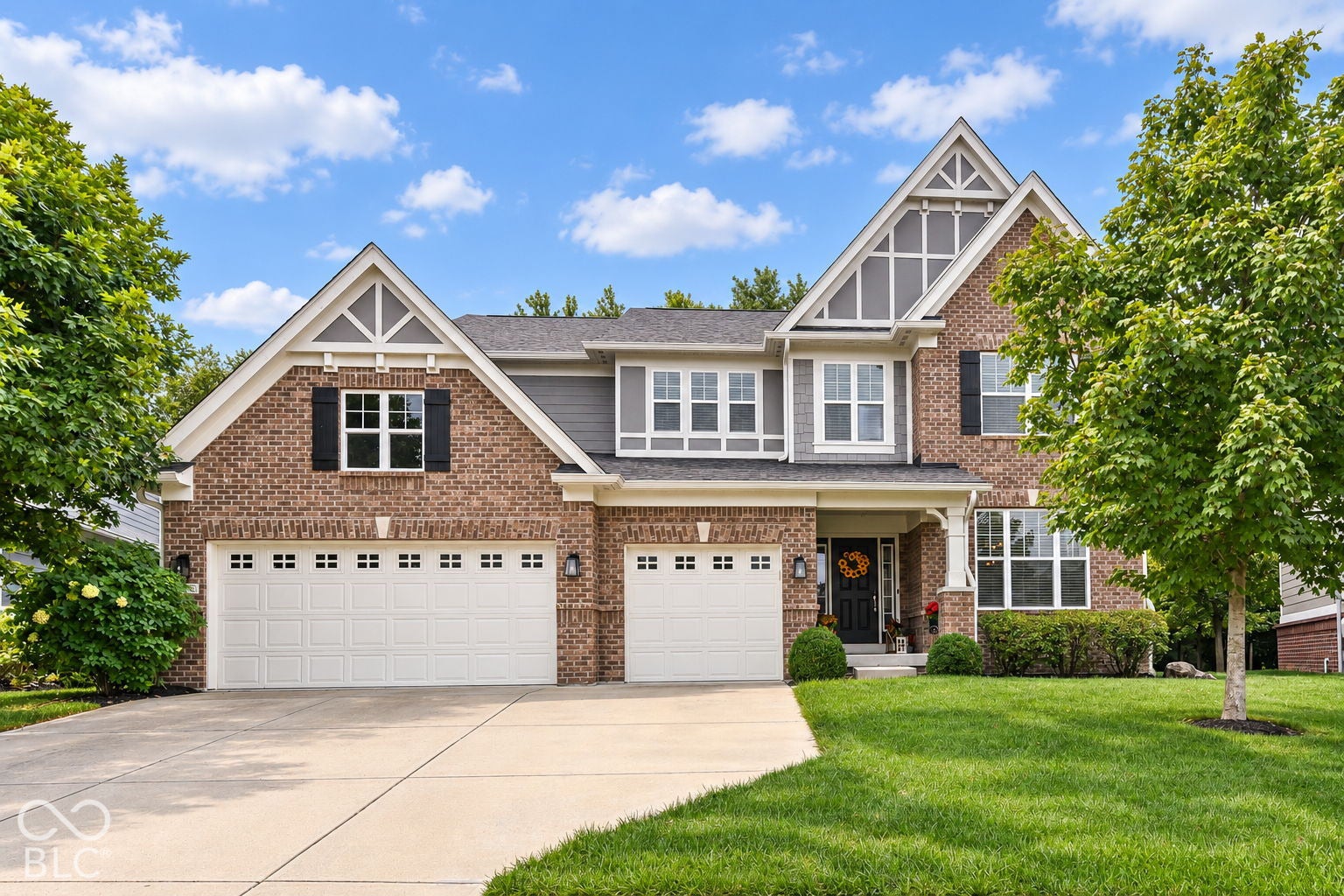 Brick and siding exterior with multiple gables
